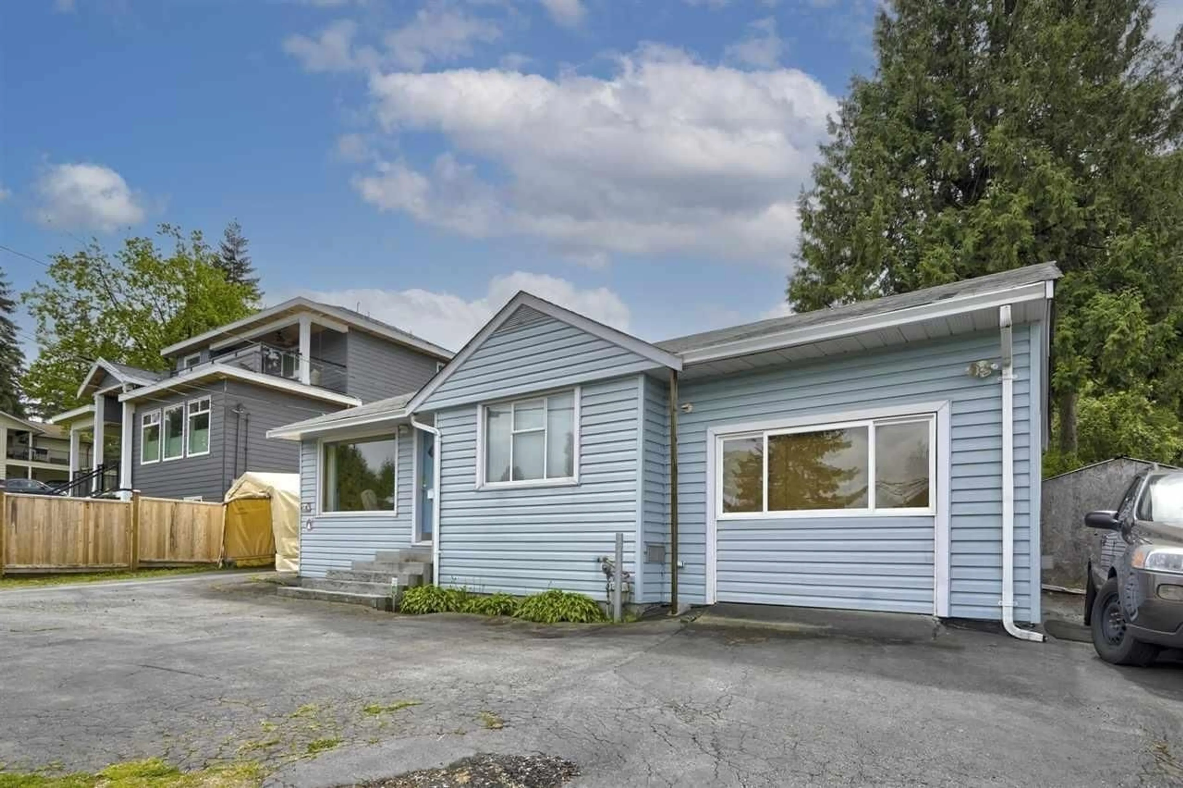 Home with vinyl exterior material, street for 12896 108 AVENUE, Surrey British Columbia V3T2H5