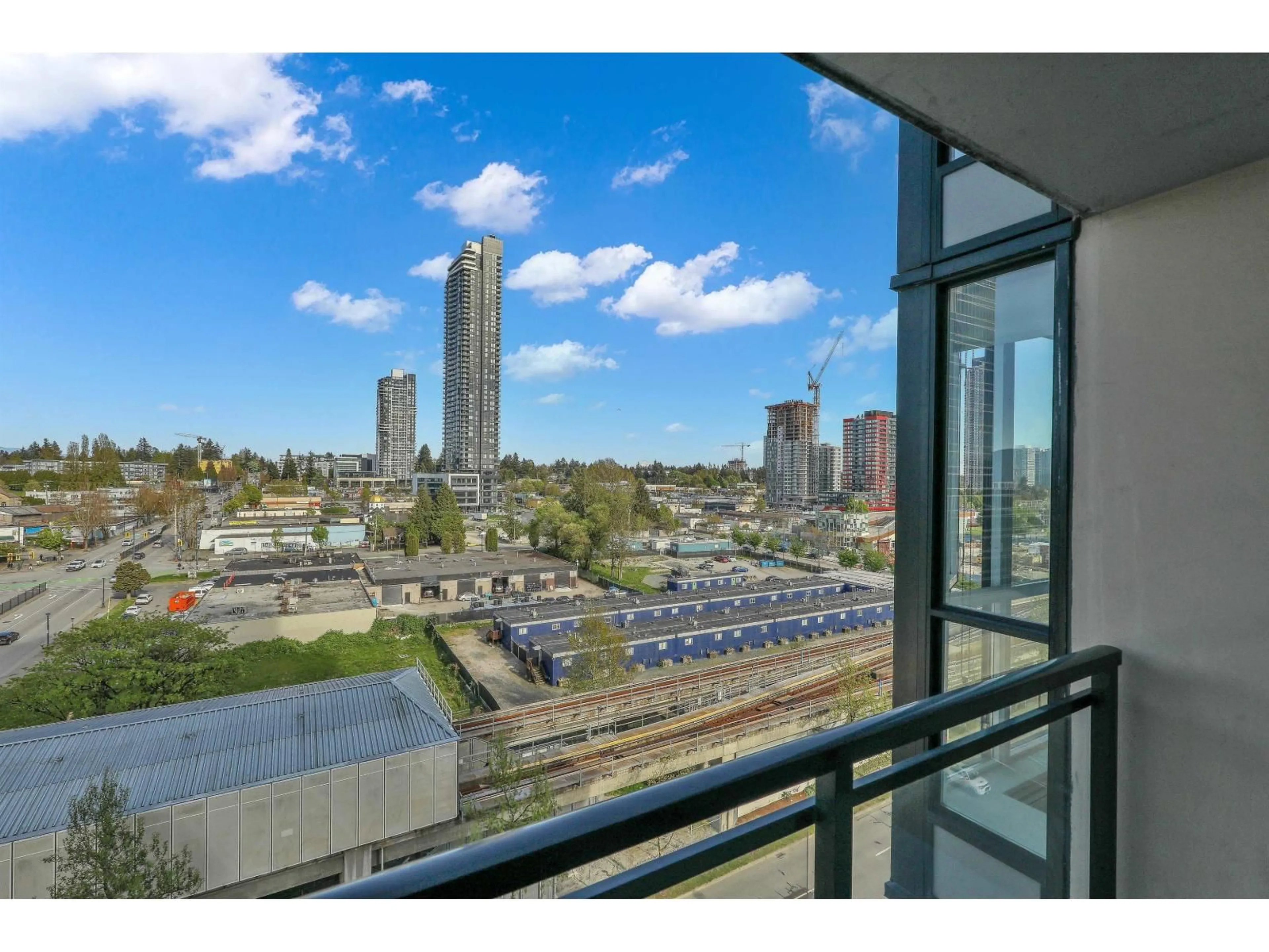 Balcony in the apartment, city buildings view from balcony for 1011 - 10777 UNIVERSITY DRIVE, Surrey British Columbia V3T0E6