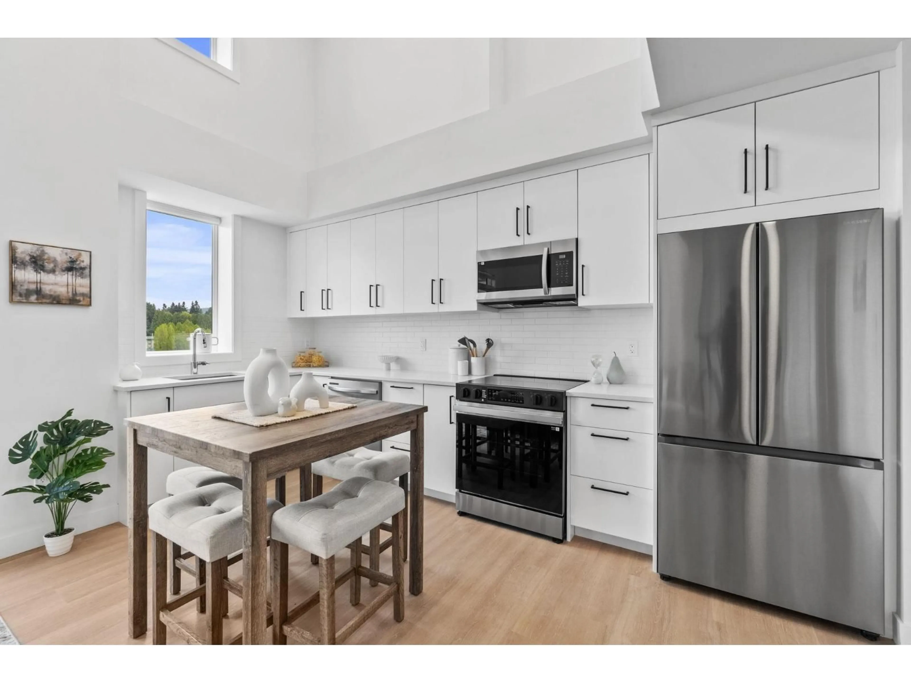 Open concept kitchen, unknown for 503 - 33820 SOUTH FRASER WAY, Abbotsford British Columbia V2S2C5