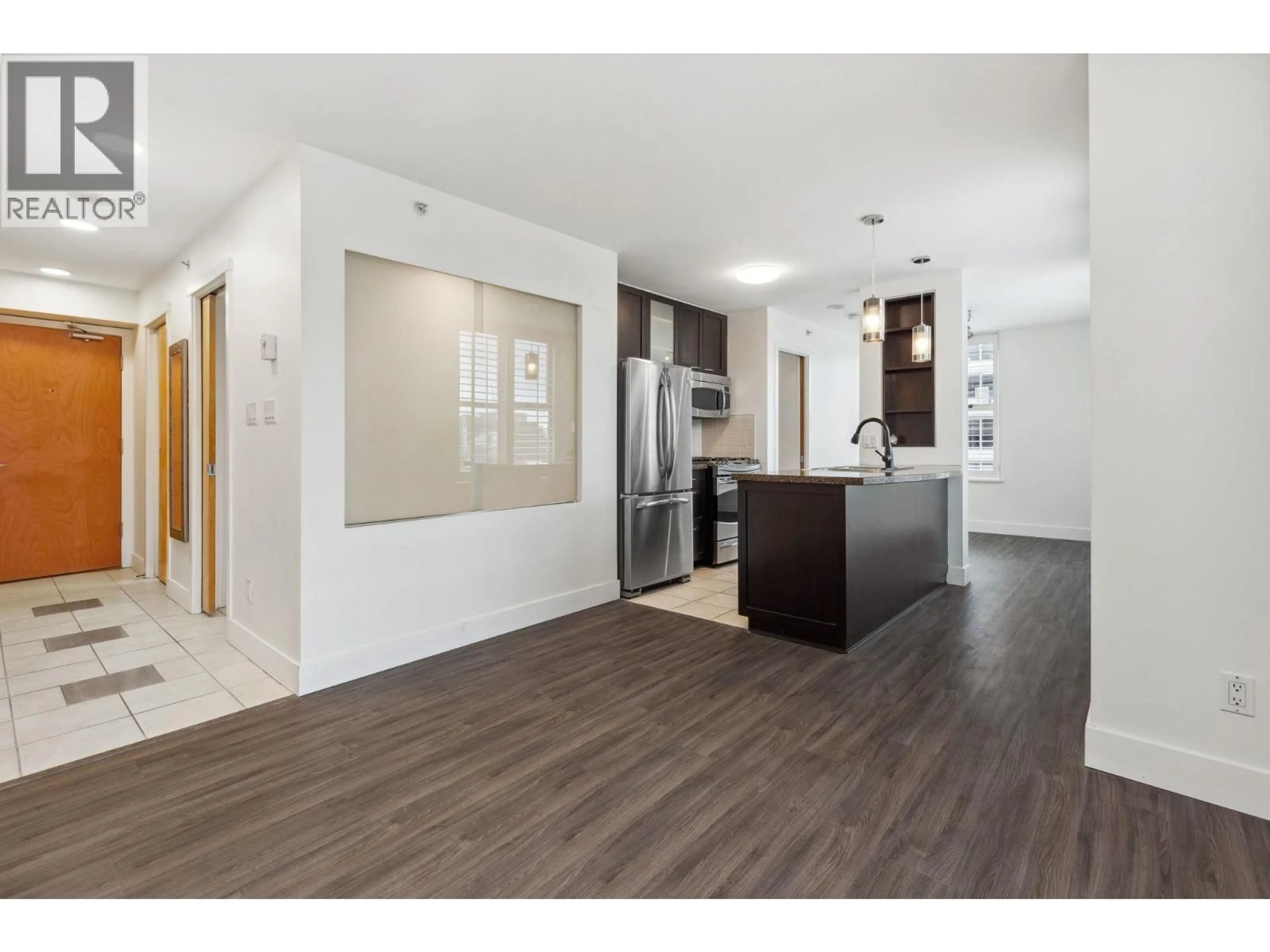 Open concept kitchen, wood/laminate floor for 2002 - 989 RICHARDS STREET, Vancouver British Columbia V6B6R6