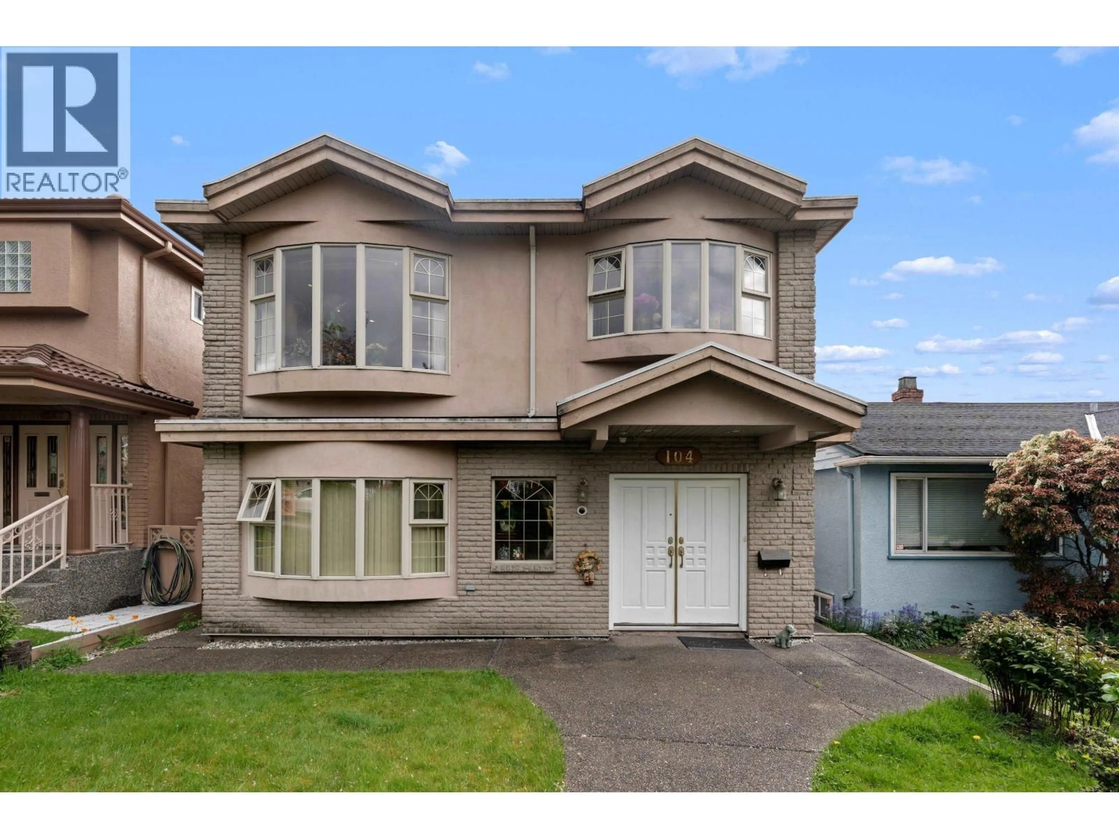 Home with vinyl exterior material, street for 104 63RD AVENUE, Vancouver British Columbia V5X2J6