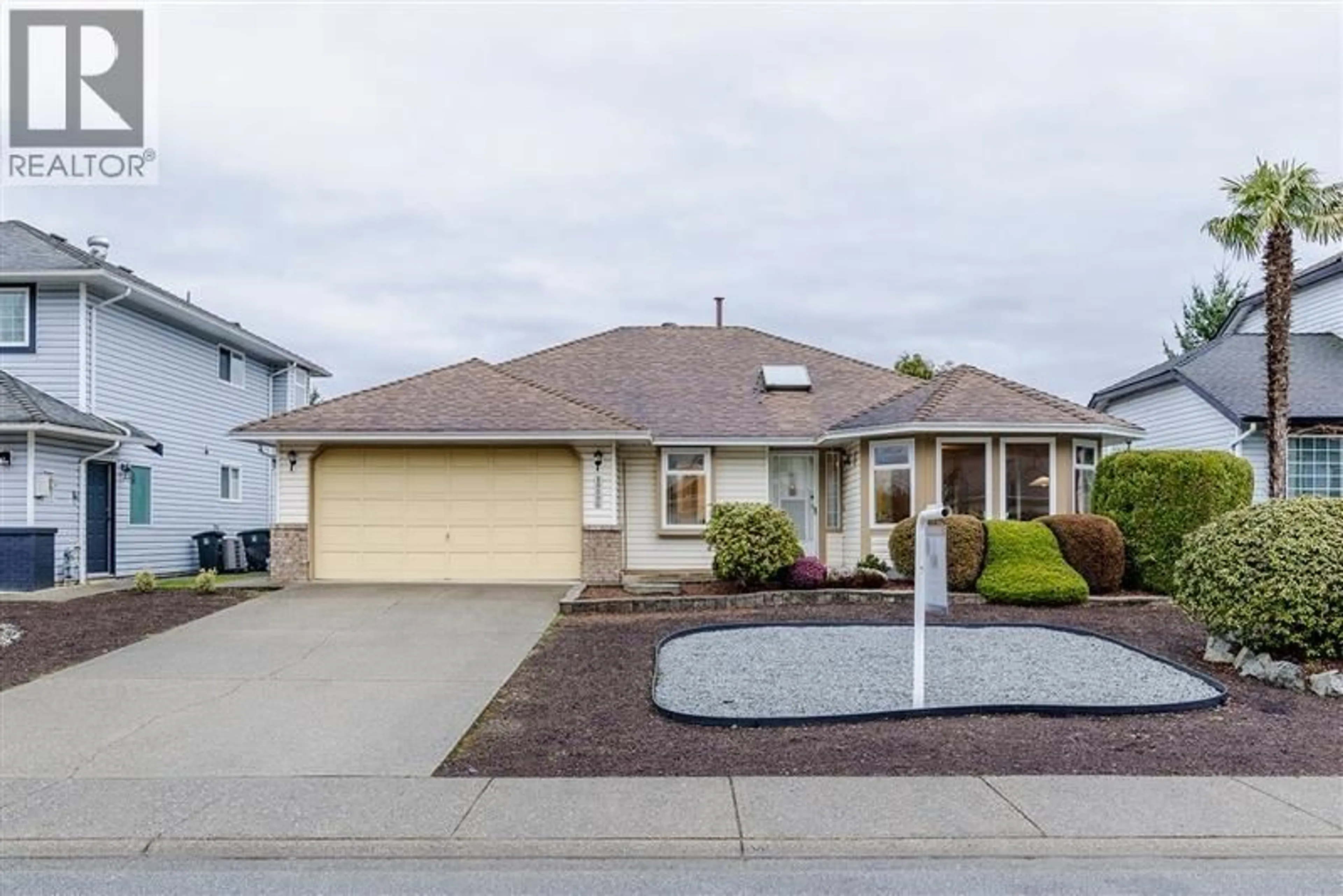 Home with vinyl exterior material, street for 19596 SOMERSET DRIVE, Pitt Meadows British Columbia V3Y2L4