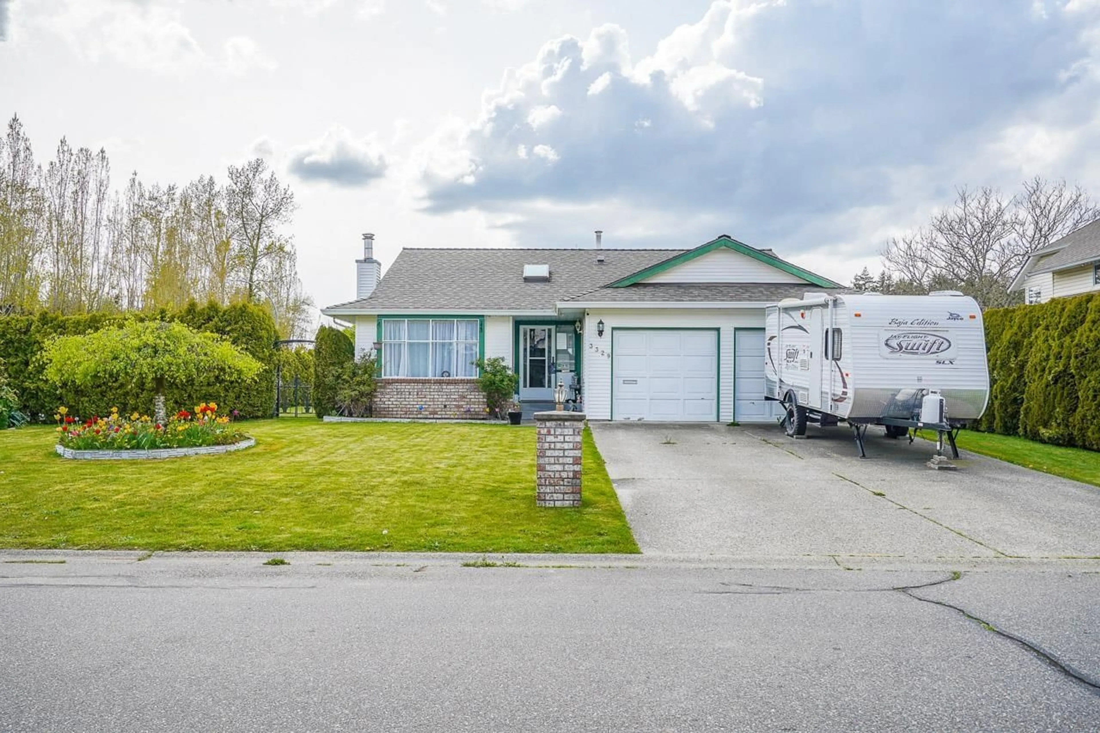 Home with vinyl exterior material, street for 3329 197 STREET, Langley British Columbia V3A7X4