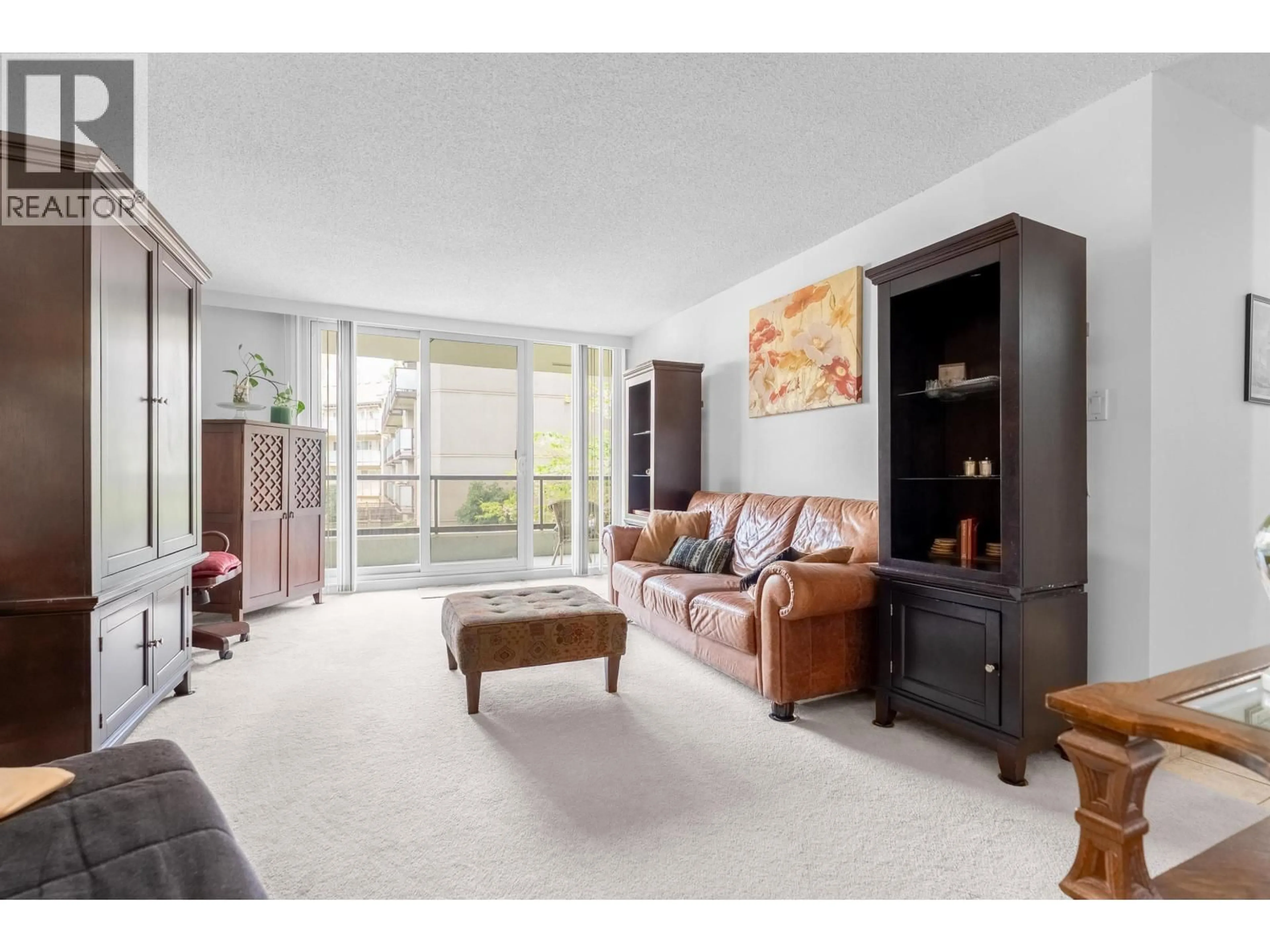 Living room with furniture, unknown for 202 - 4353 HALIFAX STREET, Burnaby British Columbia V5C5Z4