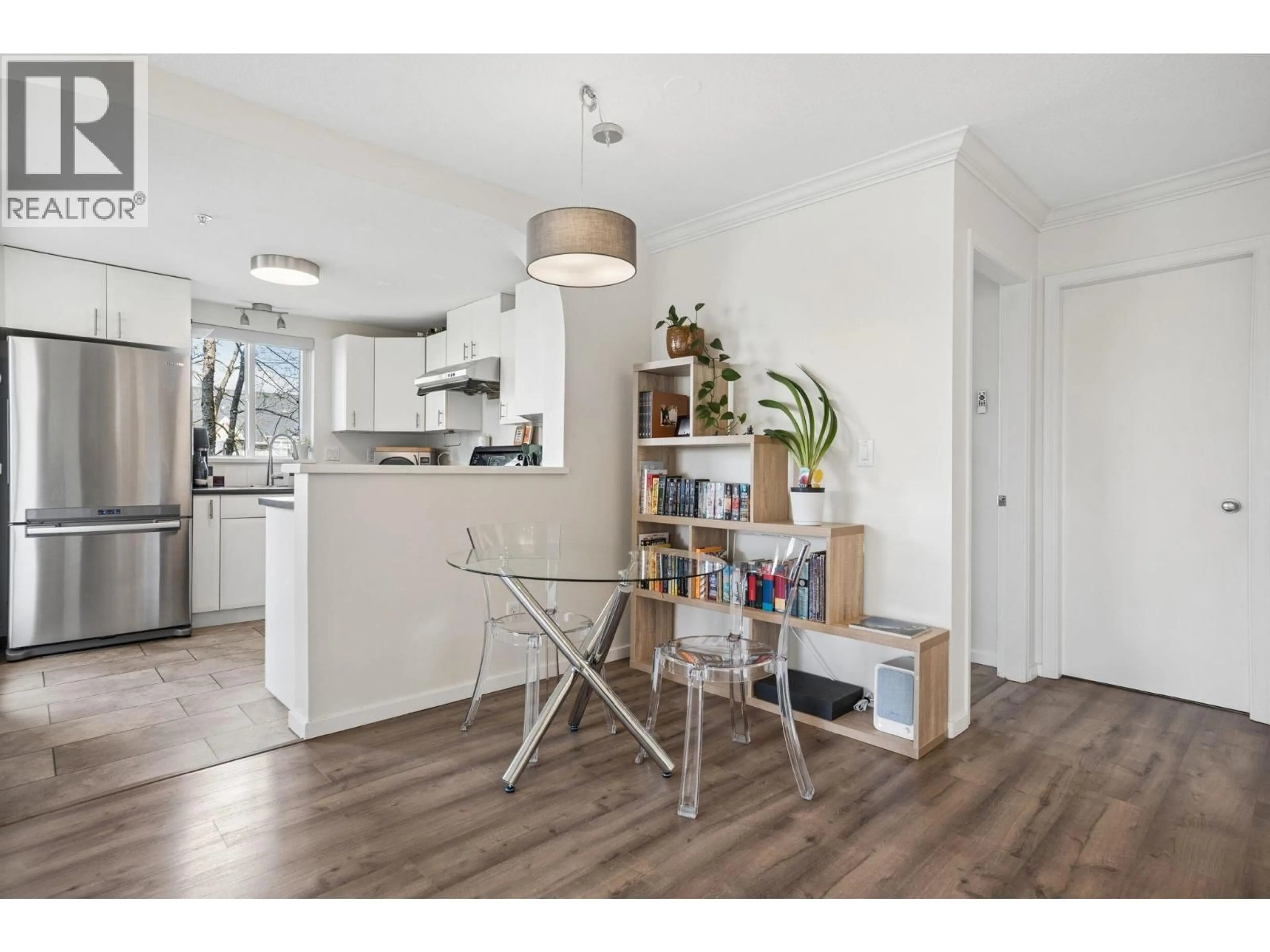 Open concept kitchen, wood/laminate floor for 304 - 6833 VILLAGE, Burnaby British Columbia V5E4M1