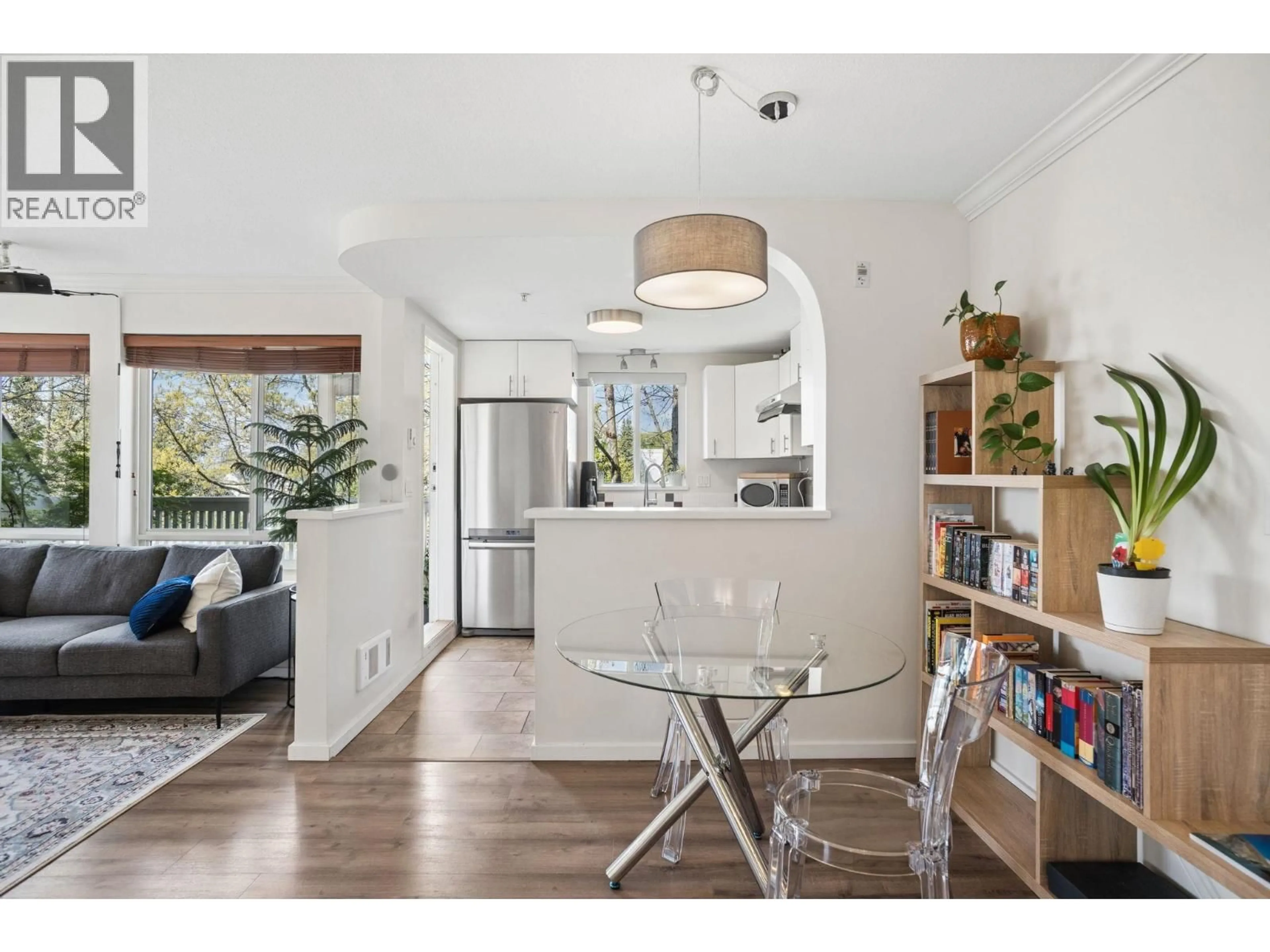 Open concept kitchen, wood/laminate floor for 304 - 6833 VILLAGE, Burnaby British Columbia V5E4M1