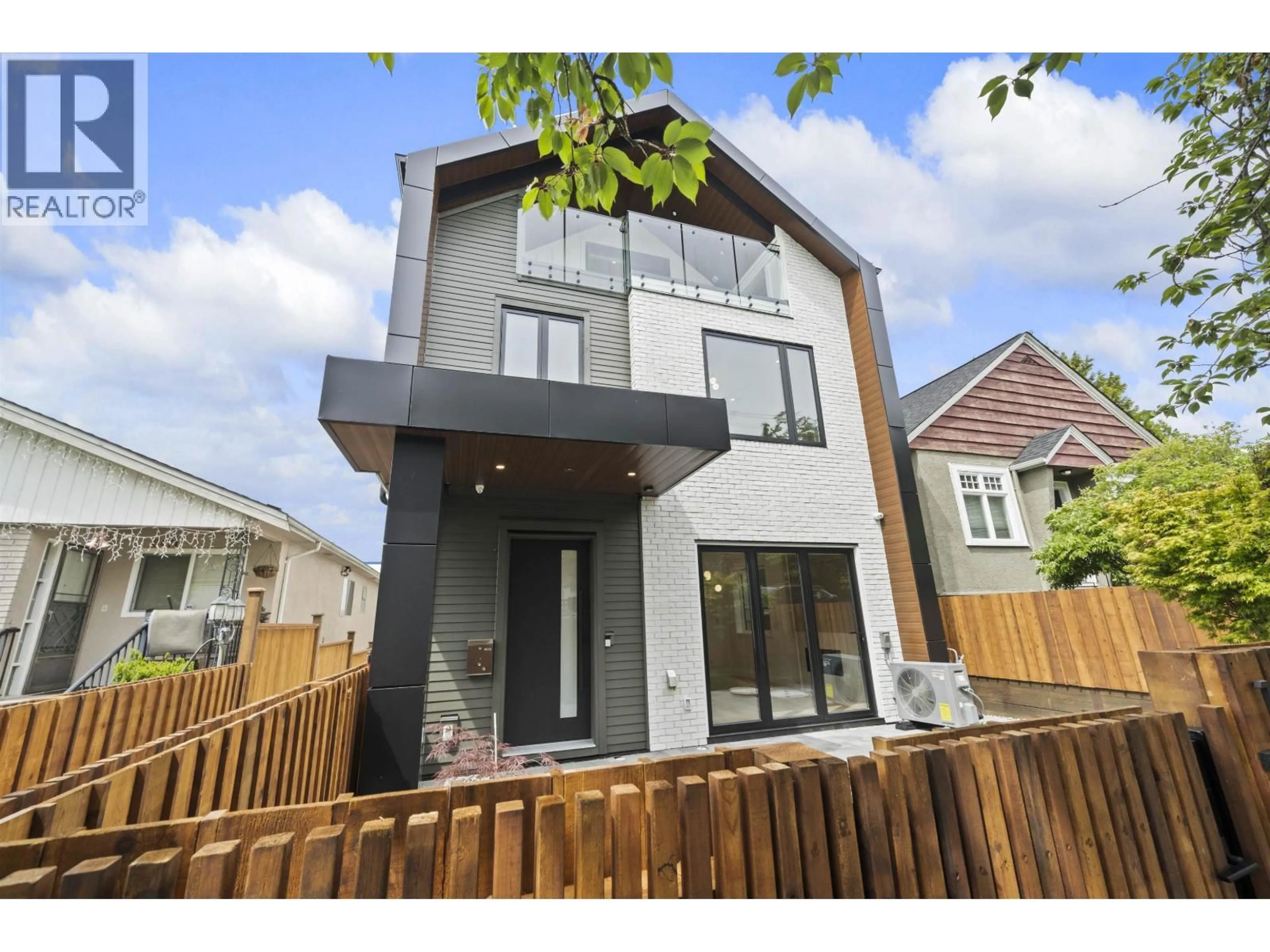 Home with brick exterior material, street for 1 - 6461 PRINCE EDWARD STREET, Vancouver British Columbia V5W2Y3