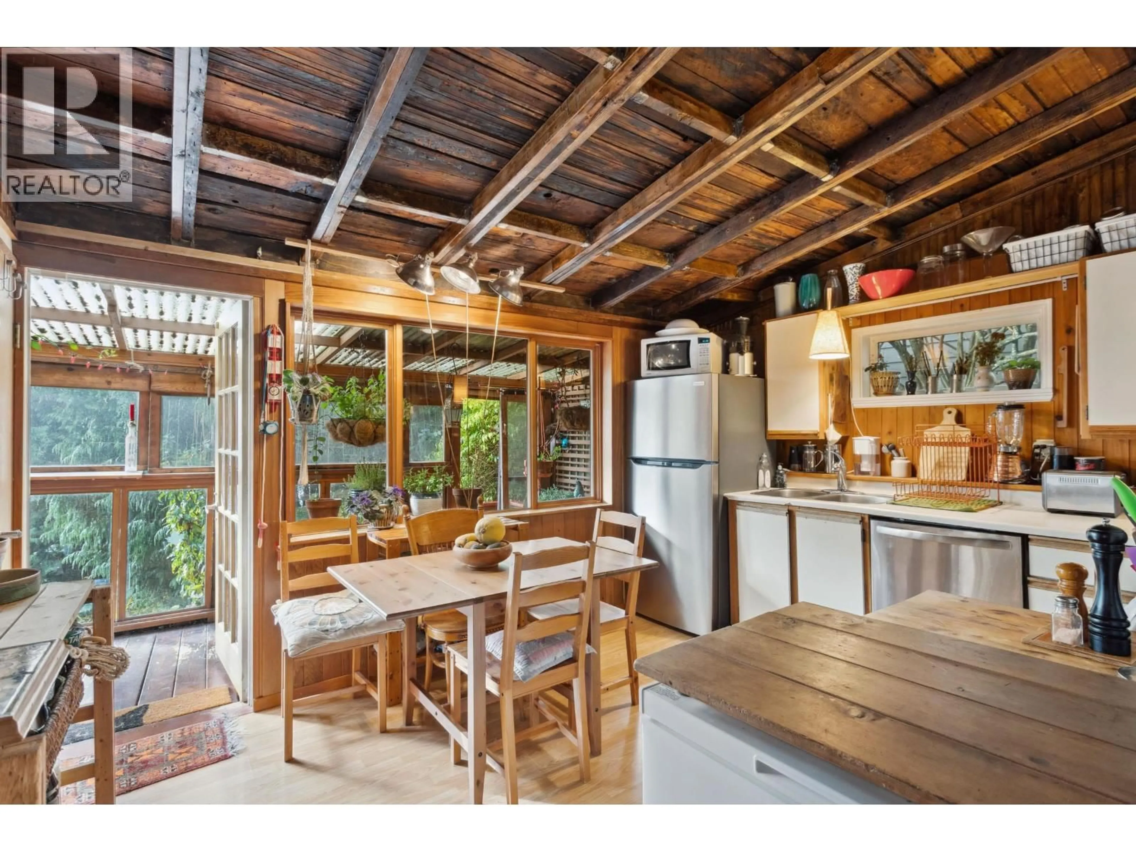 Rustic kitchen, wood/laminate floor for 713 ST. JAMES ROAD, North Vancouver British Columbia V7K1G9