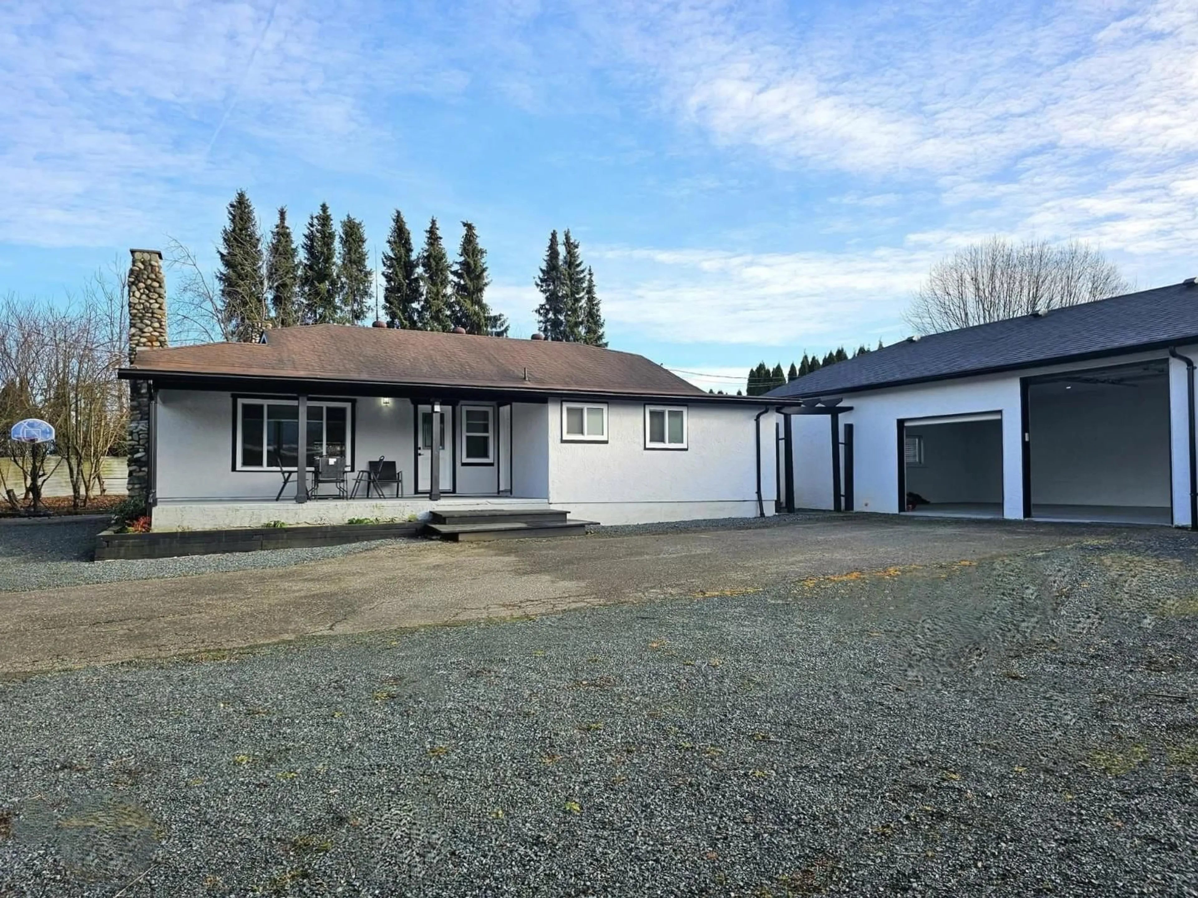 A pic from outside/outdoor area/front of a property/back of a property/a pic from drone, street for 7088 SUMAS PRAIRIE ROAD, Sardis - Greendale British Columbia V2R4K1