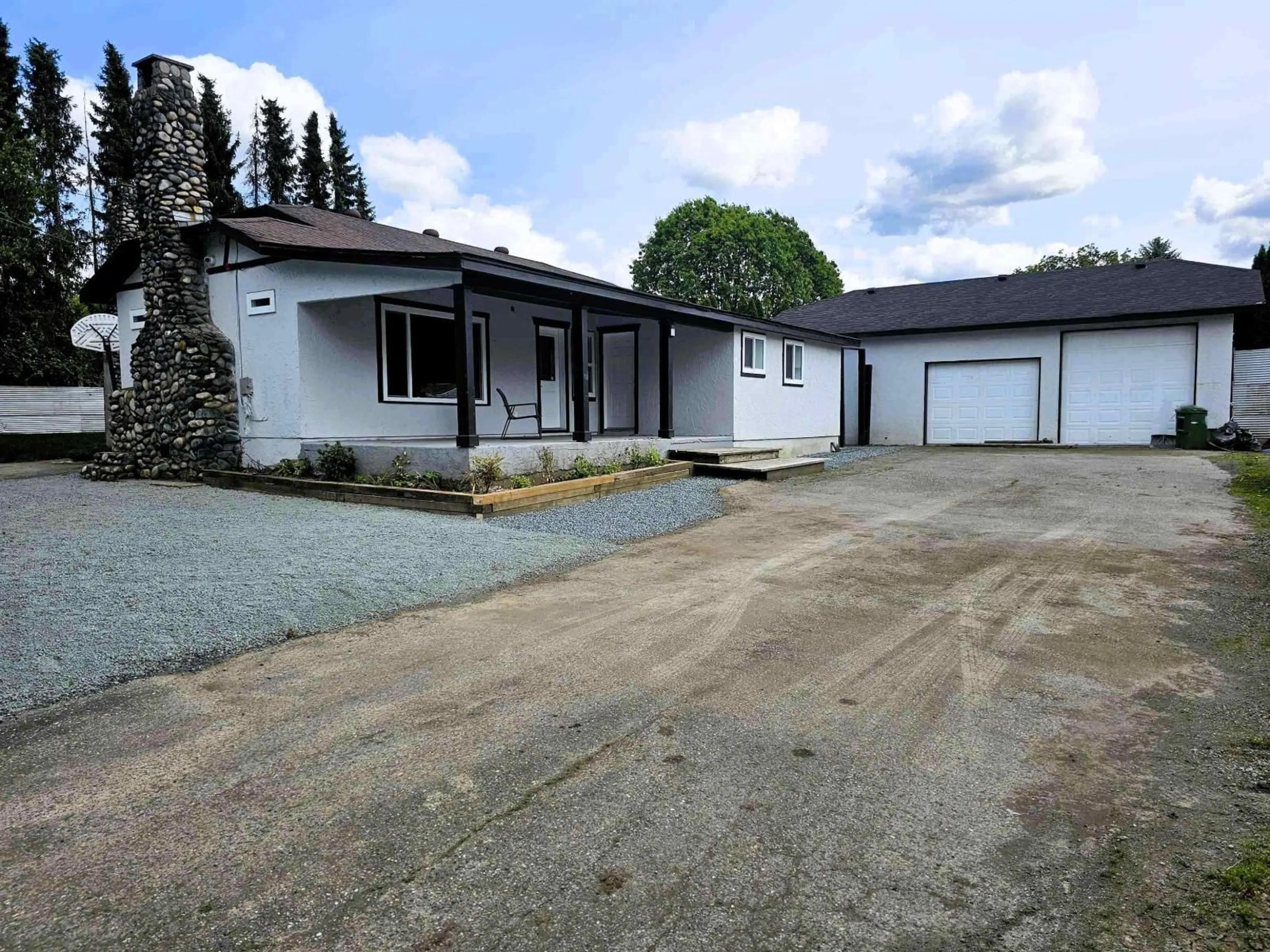A pic from outside/outdoor area/front of a property/back of a property/a pic from drone, street for 7088 SUMAS PRAIRIE ROAD, Sardis - Greendale British Columbia V2R4K1