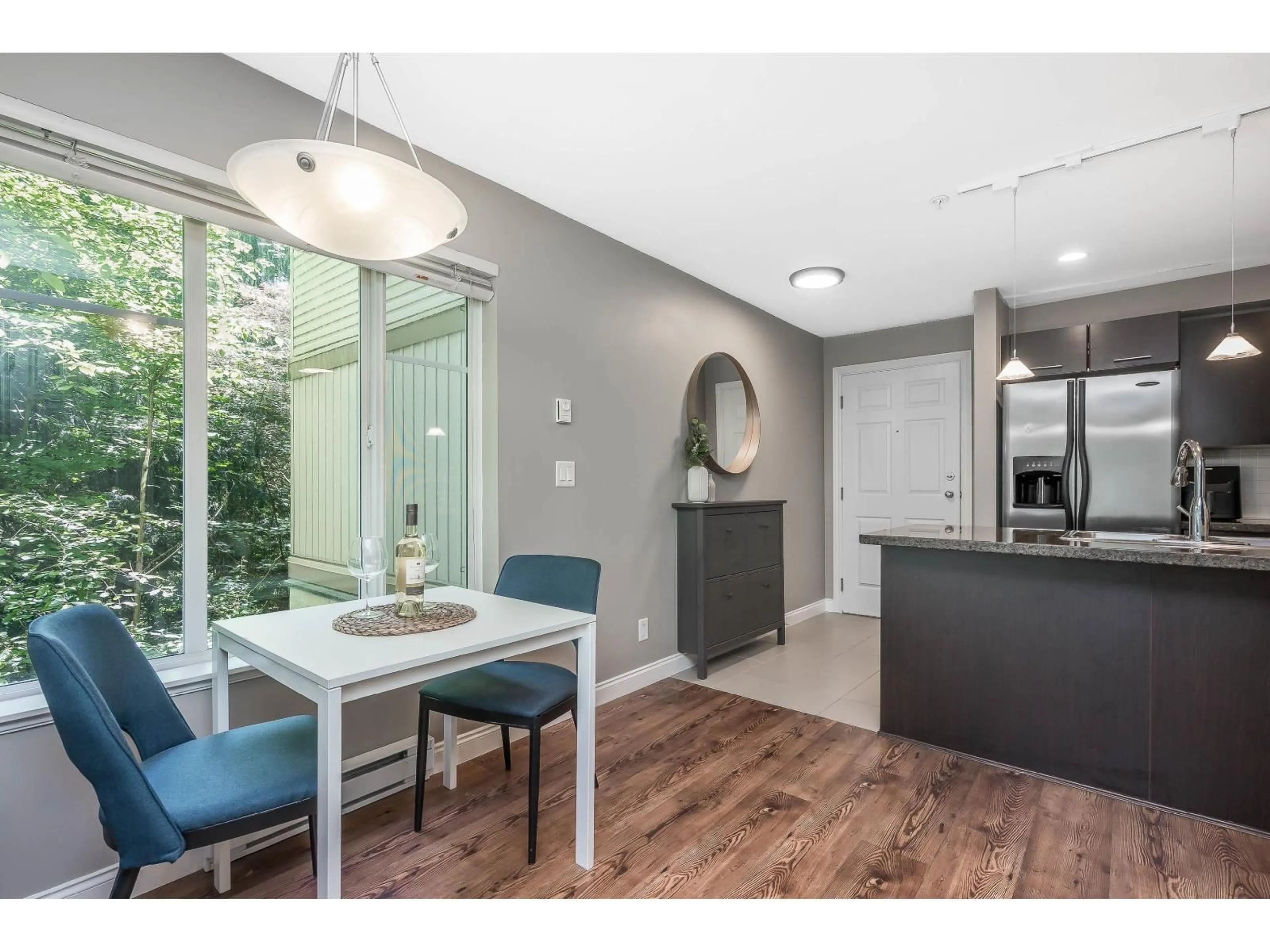 Open concept kitchen, wood/laminate floor for 107 - 5454 198 STREET, Langley British Columbia V3A1G2