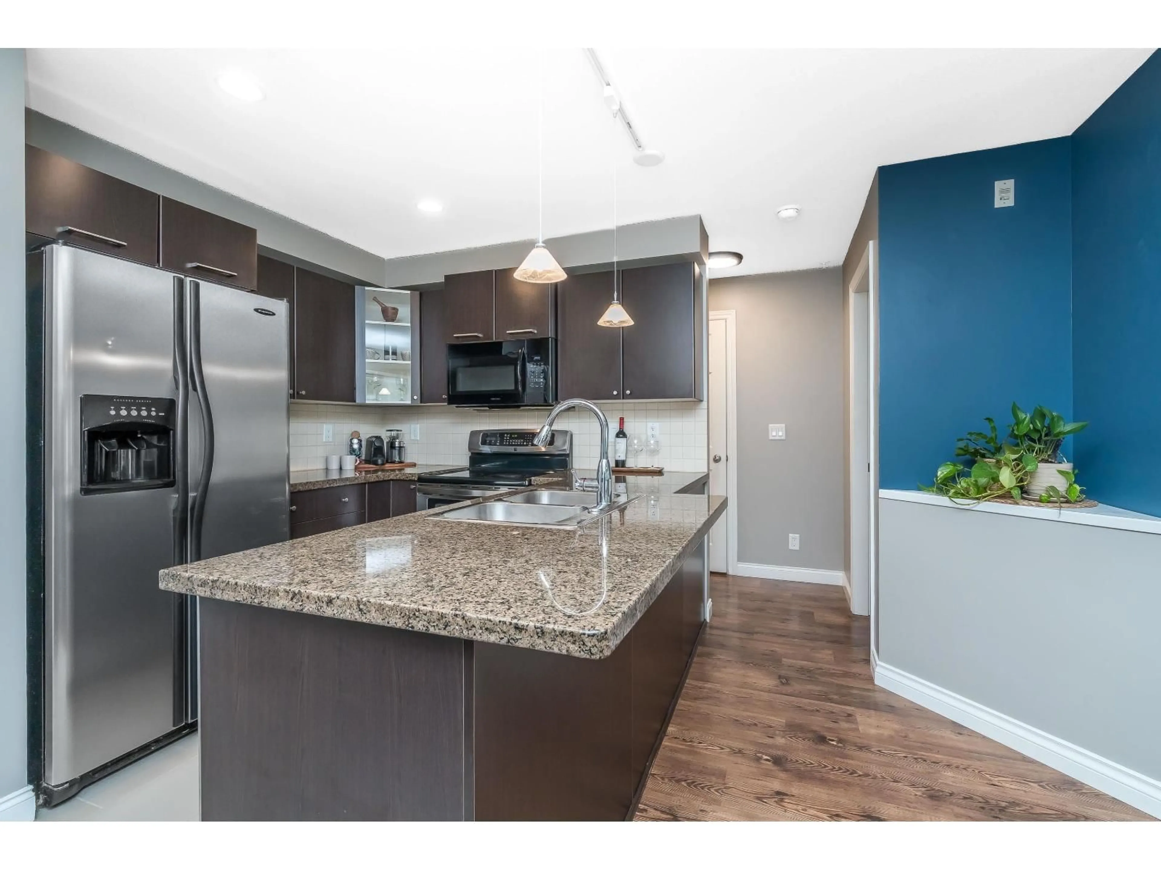 Open concept kitchen, unknown for 107 - 5454 198 STREET, Langley British Columbia V3A1G2