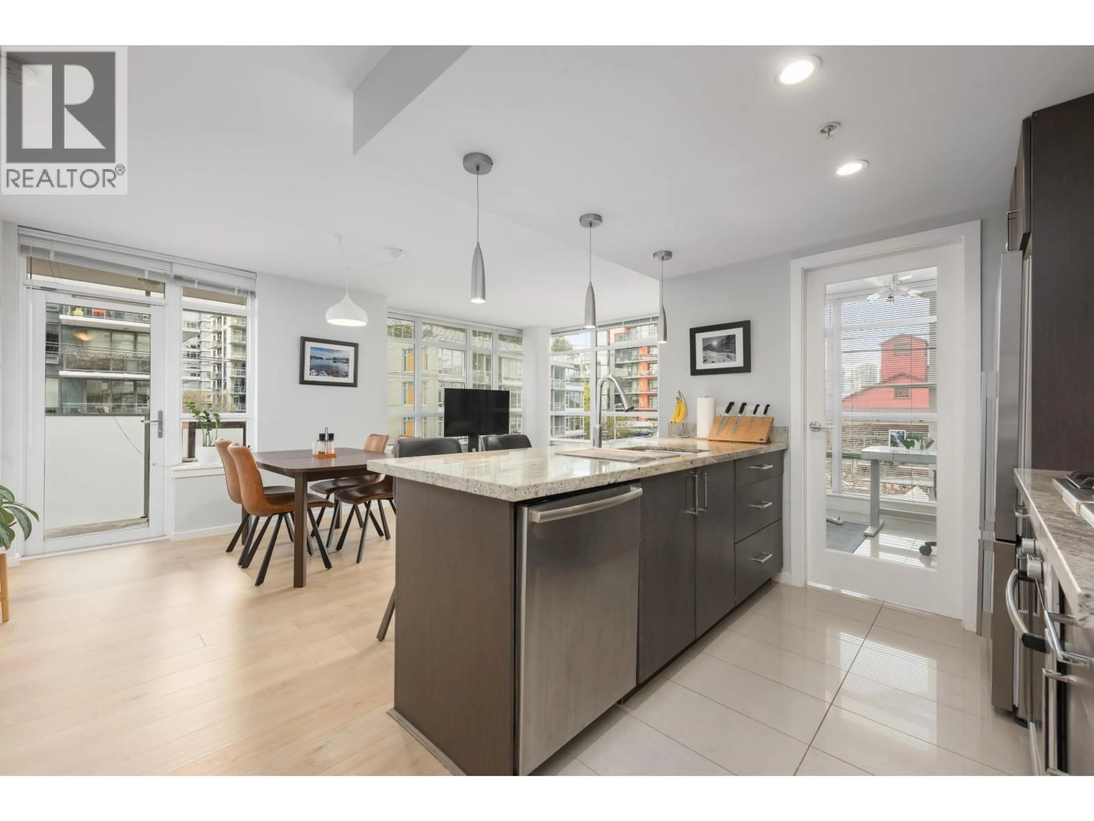 Open concept kitchen, ceramic/tile floor for 306 - 89 2ND AVENUE, Vancouver British Columbia V5Y0G9