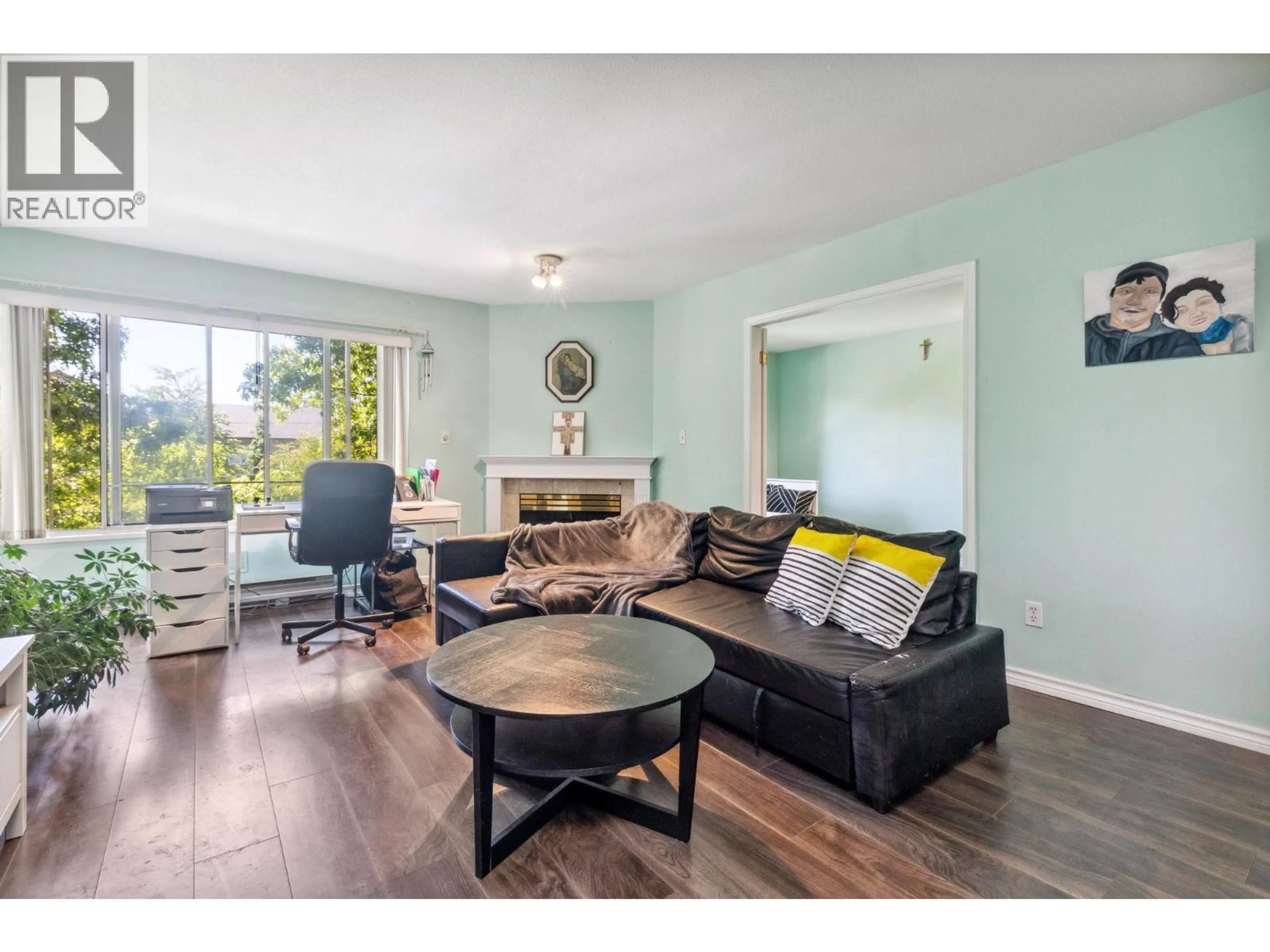 Living room with furniture, wood/laminate floor for 309 - 7368 ROYAL OAK AVENUE, Burnaby British Columbia V5J4J6