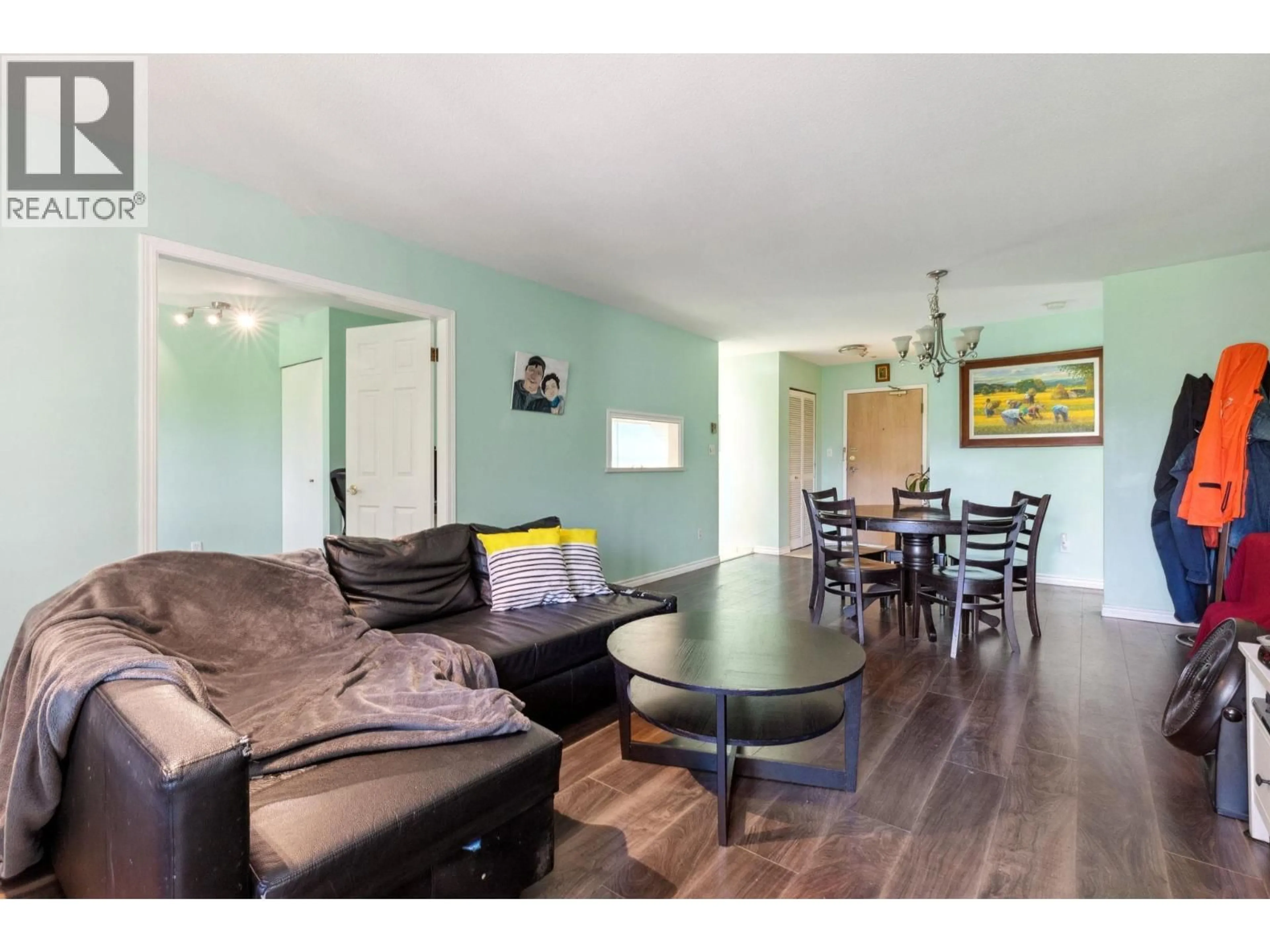 Living room with furniture, wood/laminate floor for 309 - 7368 ROYAL OAK AVENUE, Burnaby British Columbia V5J4J6