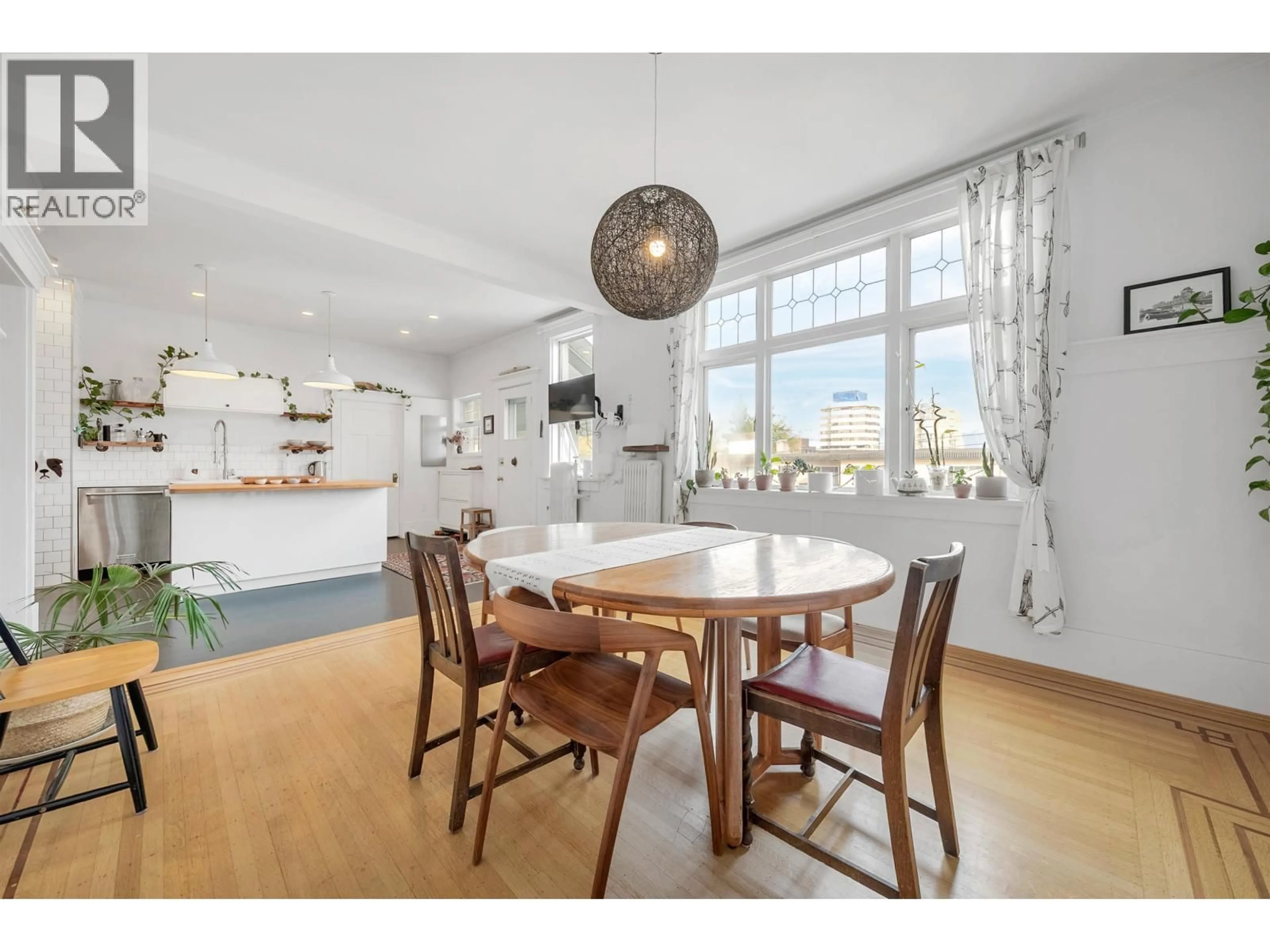 Open concept kitchen, wood/laminate floor for 303 - 1131 11TH AVENUE, Vancouver British Columbia V6H1K4