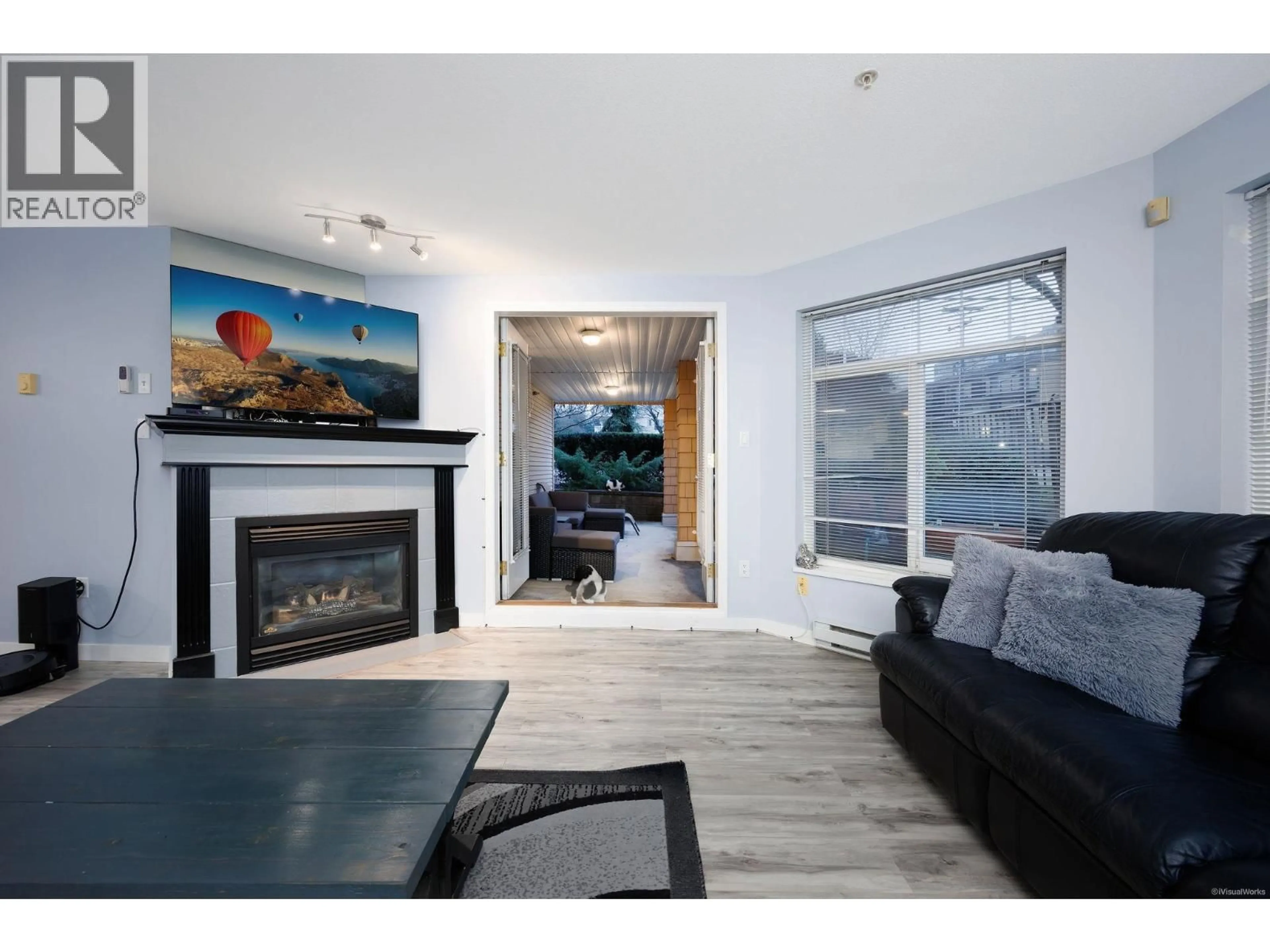 Living room with furniture, wood/laminate floor for 111 - 12207 224 STREET, Maple Ridge British Columbia V2X6B9