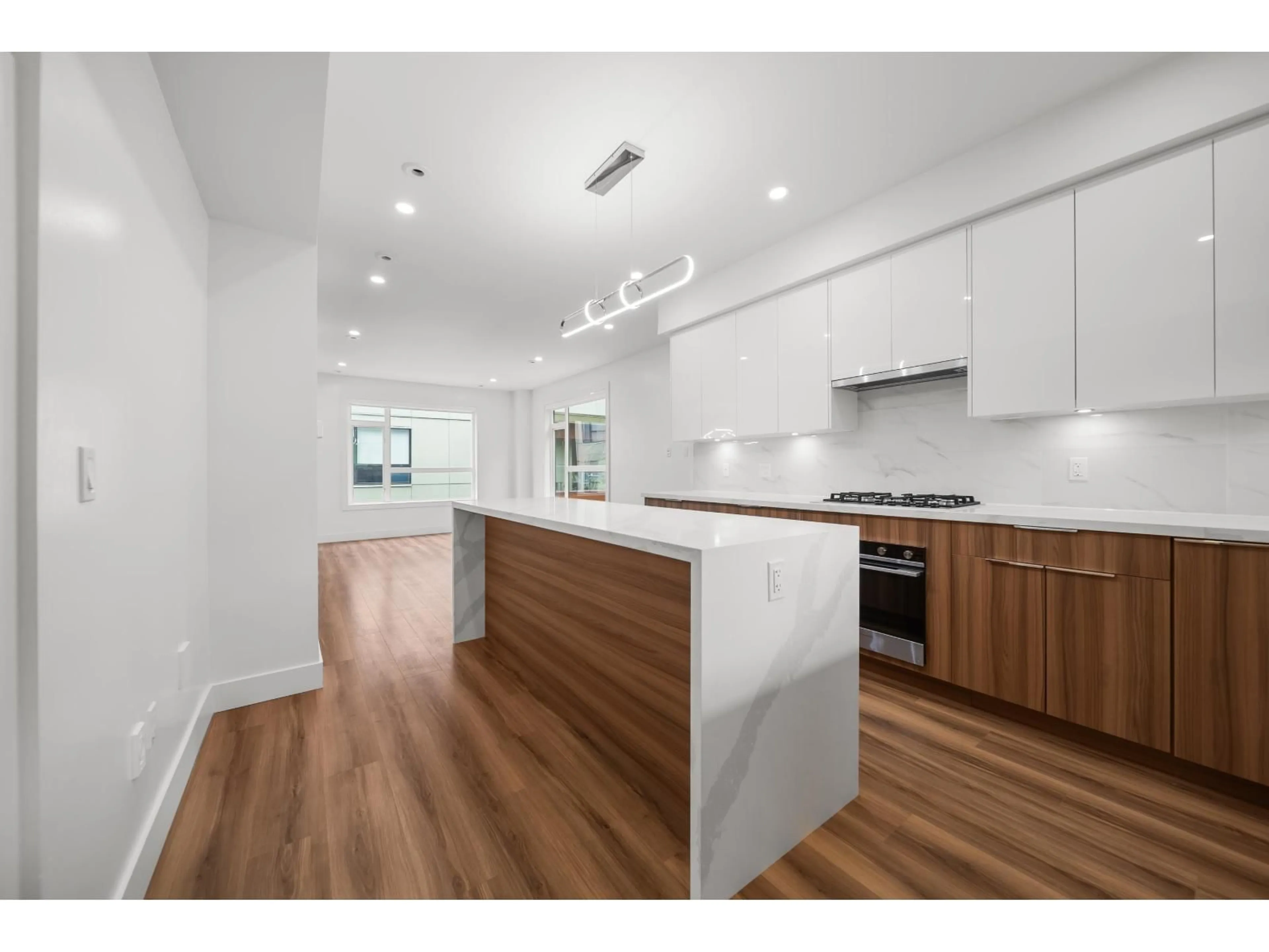 Open concept kitchen, wood/laminate floor for 9 - 5858 132 STREET, Surrey British Columbia V3X1N1