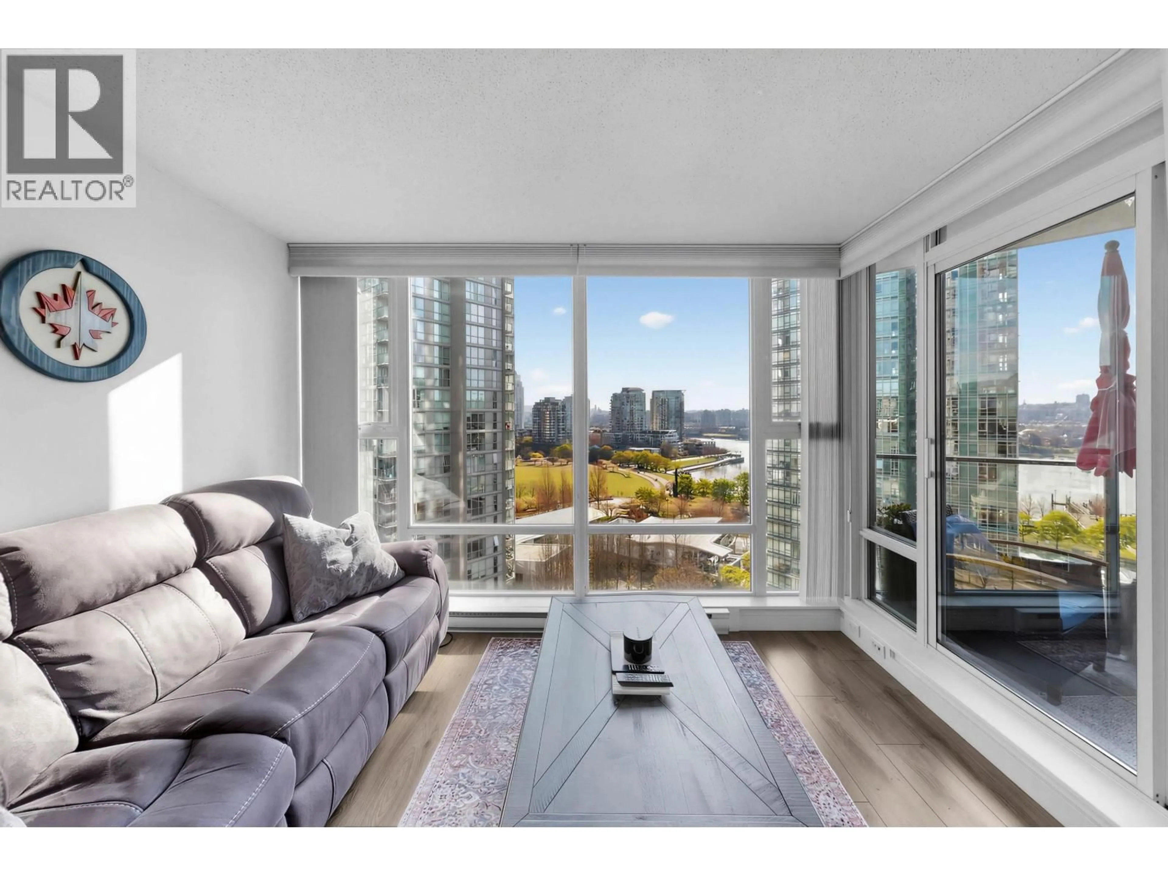 Living room with furniture, wood/laminate floor for 1501 - 455 BEACH CRESCENT, Vancouver British Columbia V6Z3E5