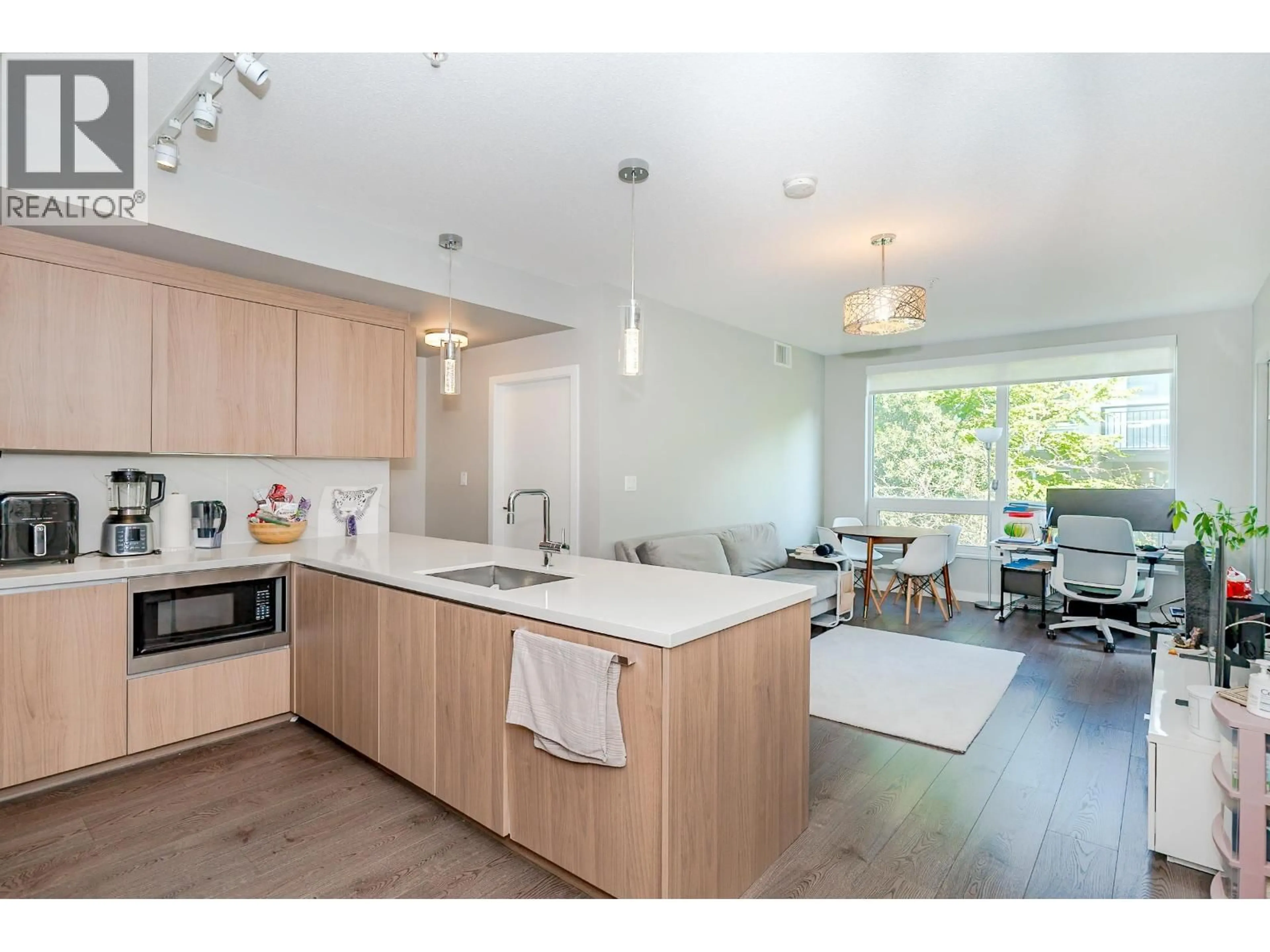 Open concept kitchen, wood/laminate floor for 330 - 9333 TOMICKI AVENUE, Richmond British Columbia V6X0L4