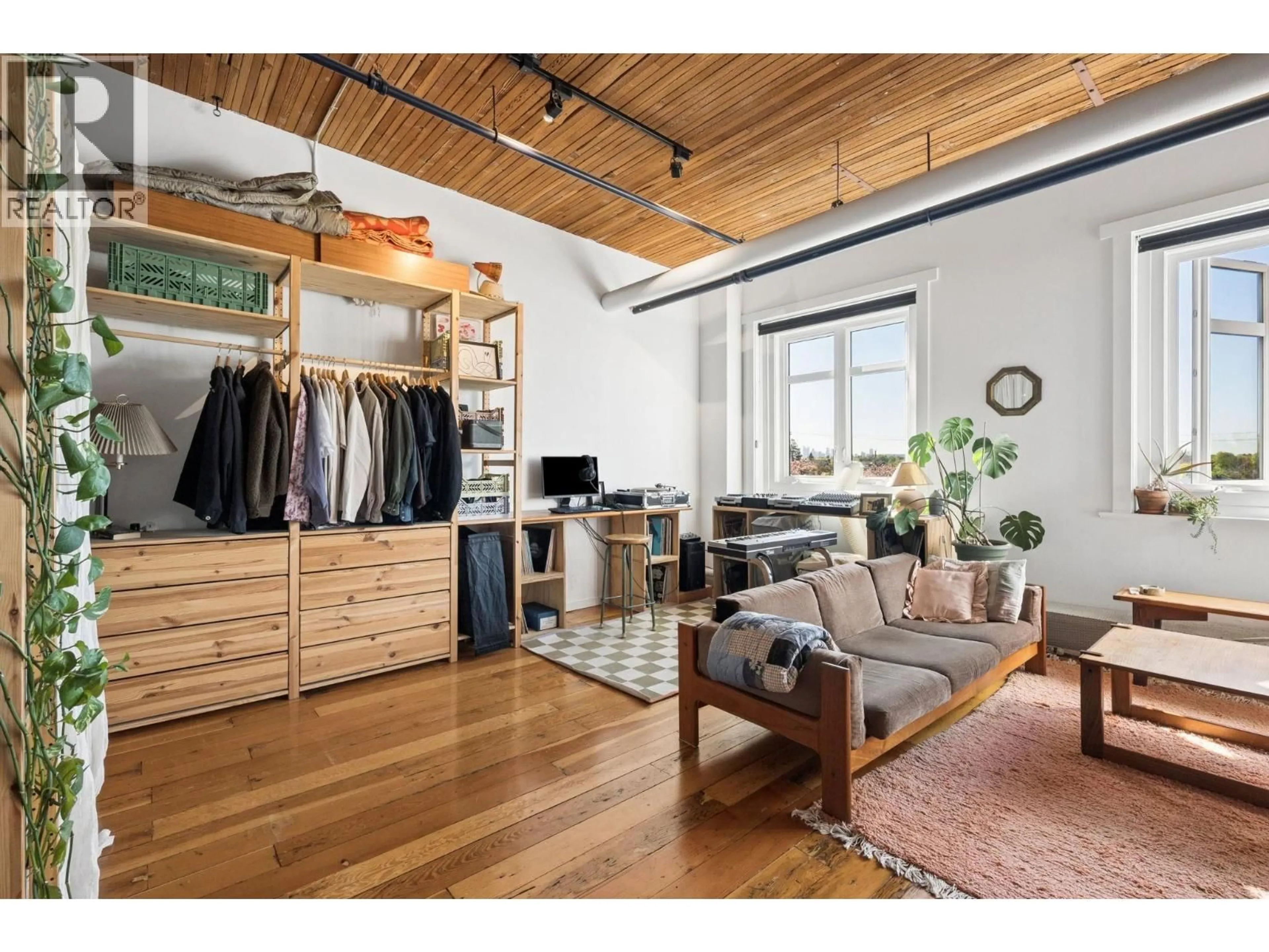 Living room with furniture, wood/laminate floor for 321 - 2556 HASTINGS STREET, Vancouver British Columbia V5K1Z3