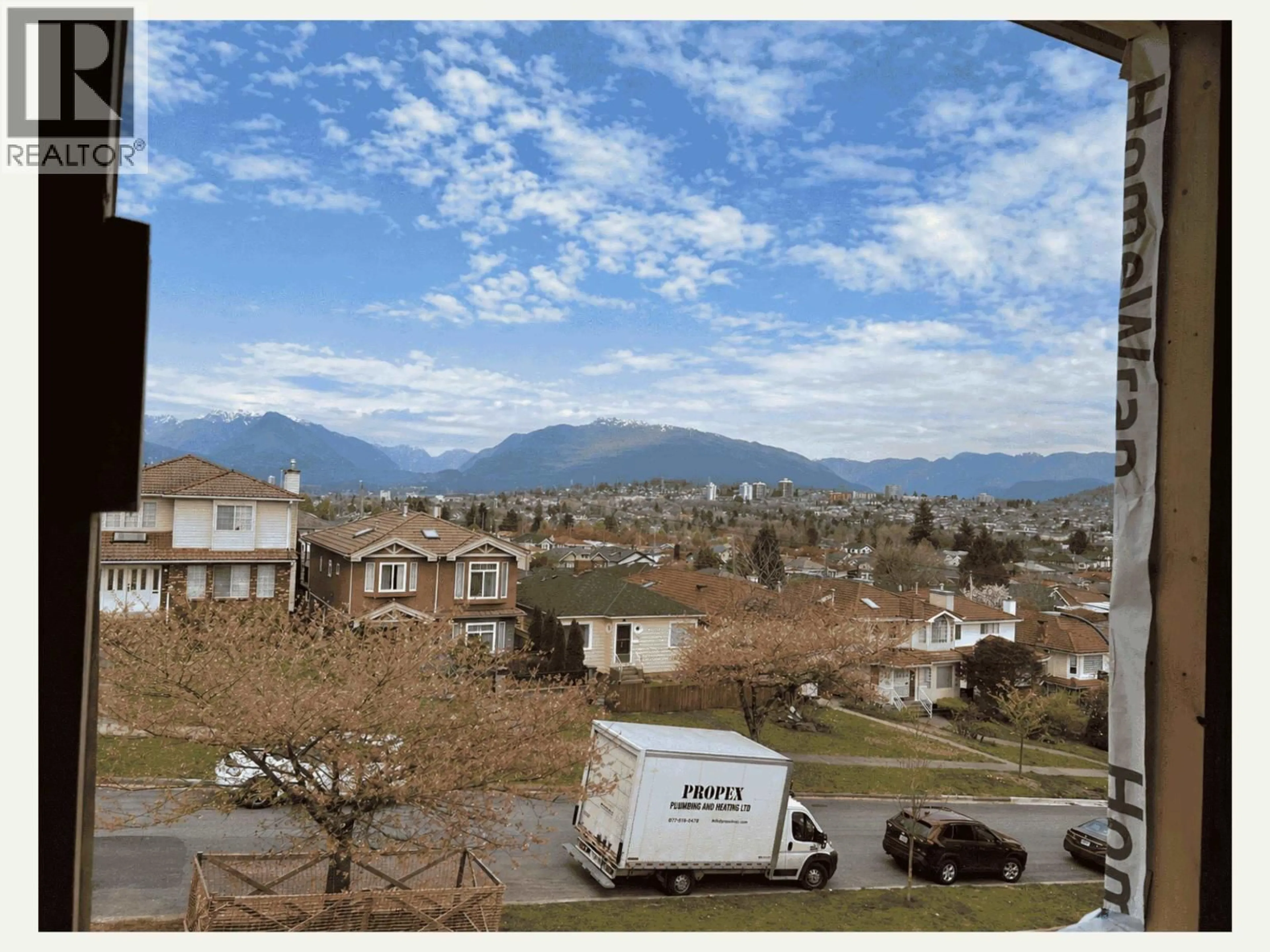 A pic from outside/outdoor area/front of a property/back of a property/a pic from drone, mountain view for 1 - 3034 5TH AVENUE, Vancouver British Columbia V5M1N8
