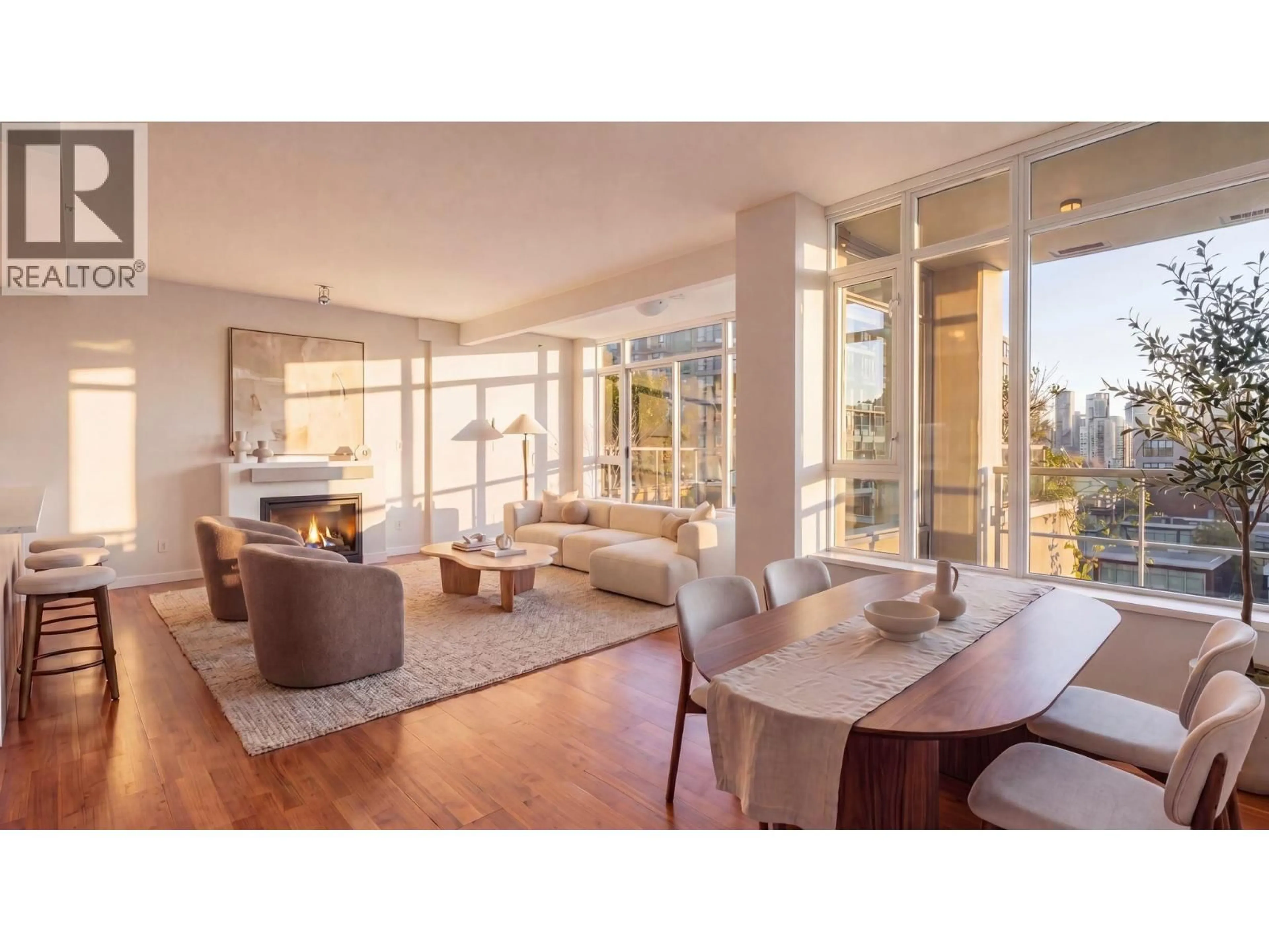 Living room with furniture, wood/laminate floor for 705 - 2055 YUKON STREET, Vancouver British Columbia V5Y4B7