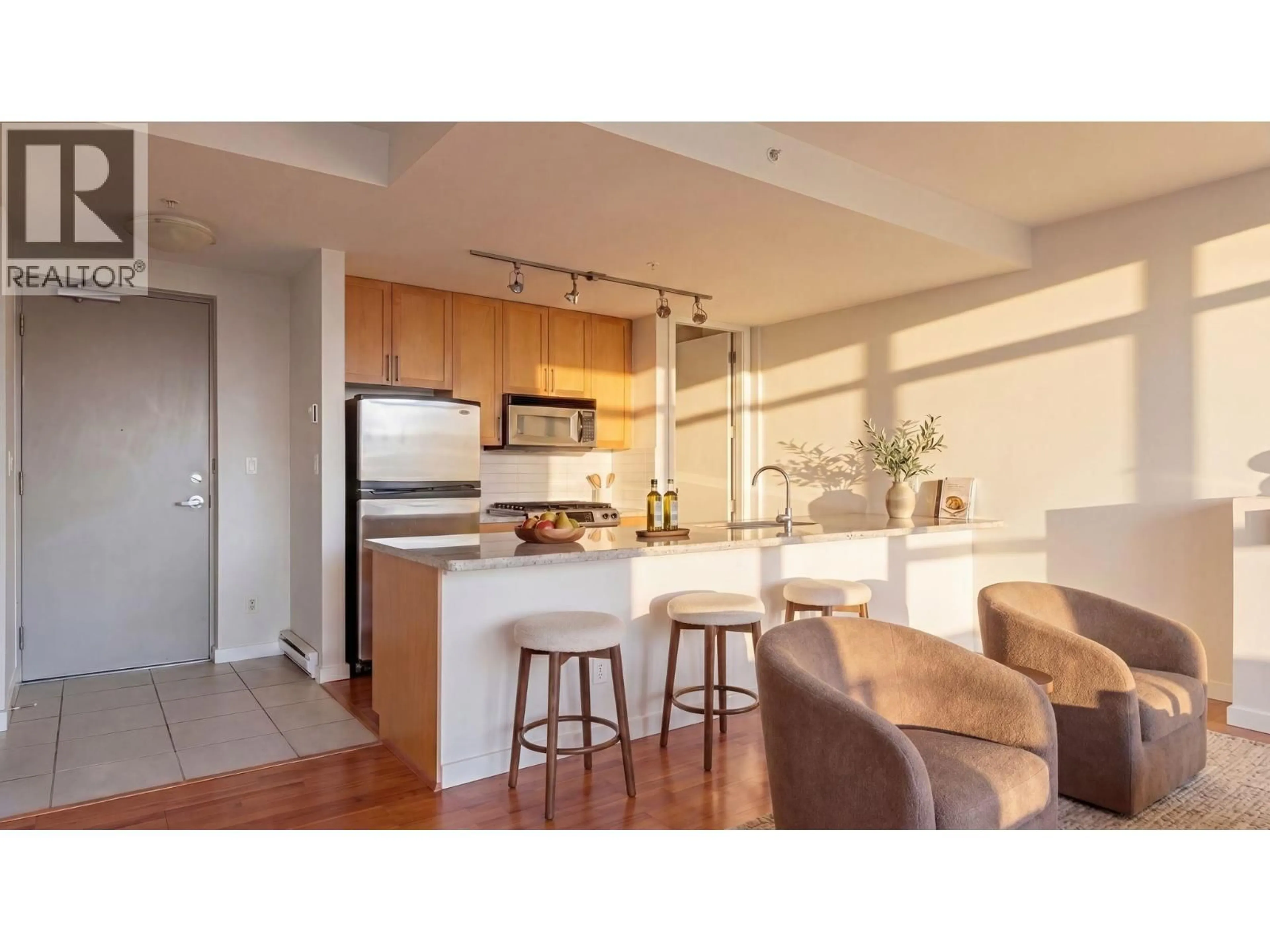 Open concept kitchen, wood/laminate floor for 705 - 2055 YUKON STREET, Vancouver British Columbia V5Y4B7
