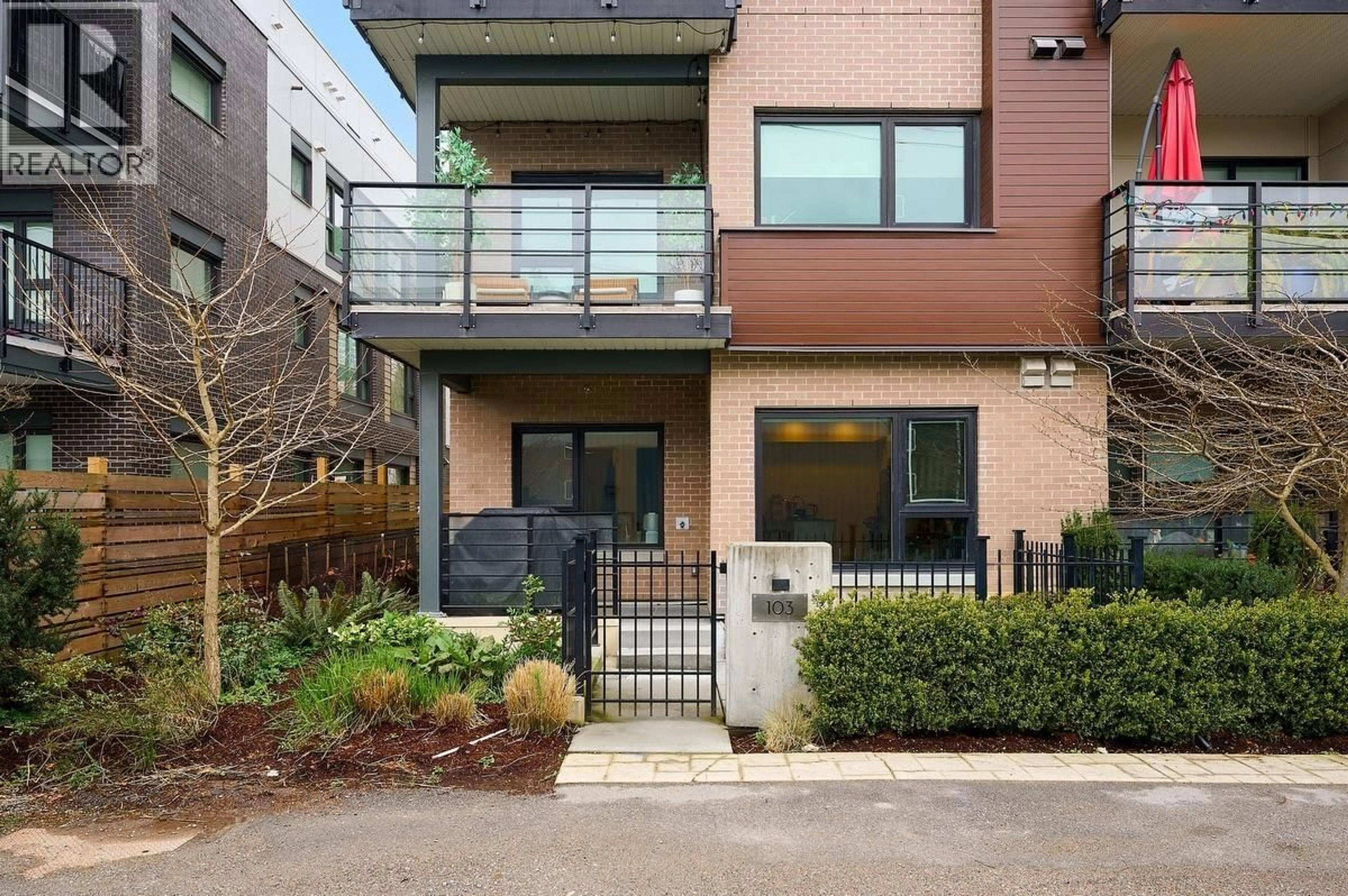 Home with brick exterior material, street for 103 - 2666 DUKE STREET, Vancouver British Columbia V5R4S9