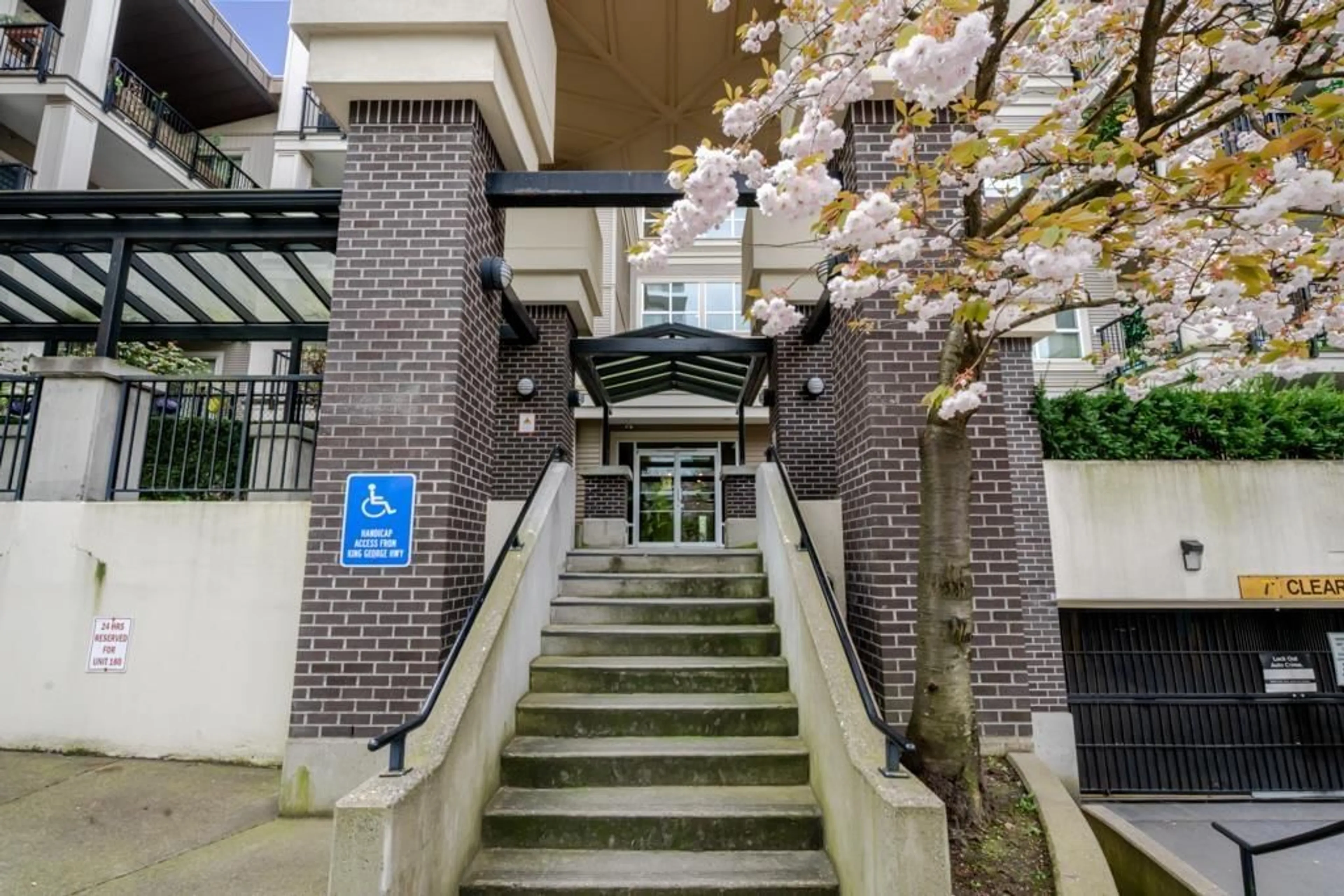 Indoor foyer for 309 - 9655 KING GEORGE BOULEVARD, Surrey British Columbia V3T0C7
