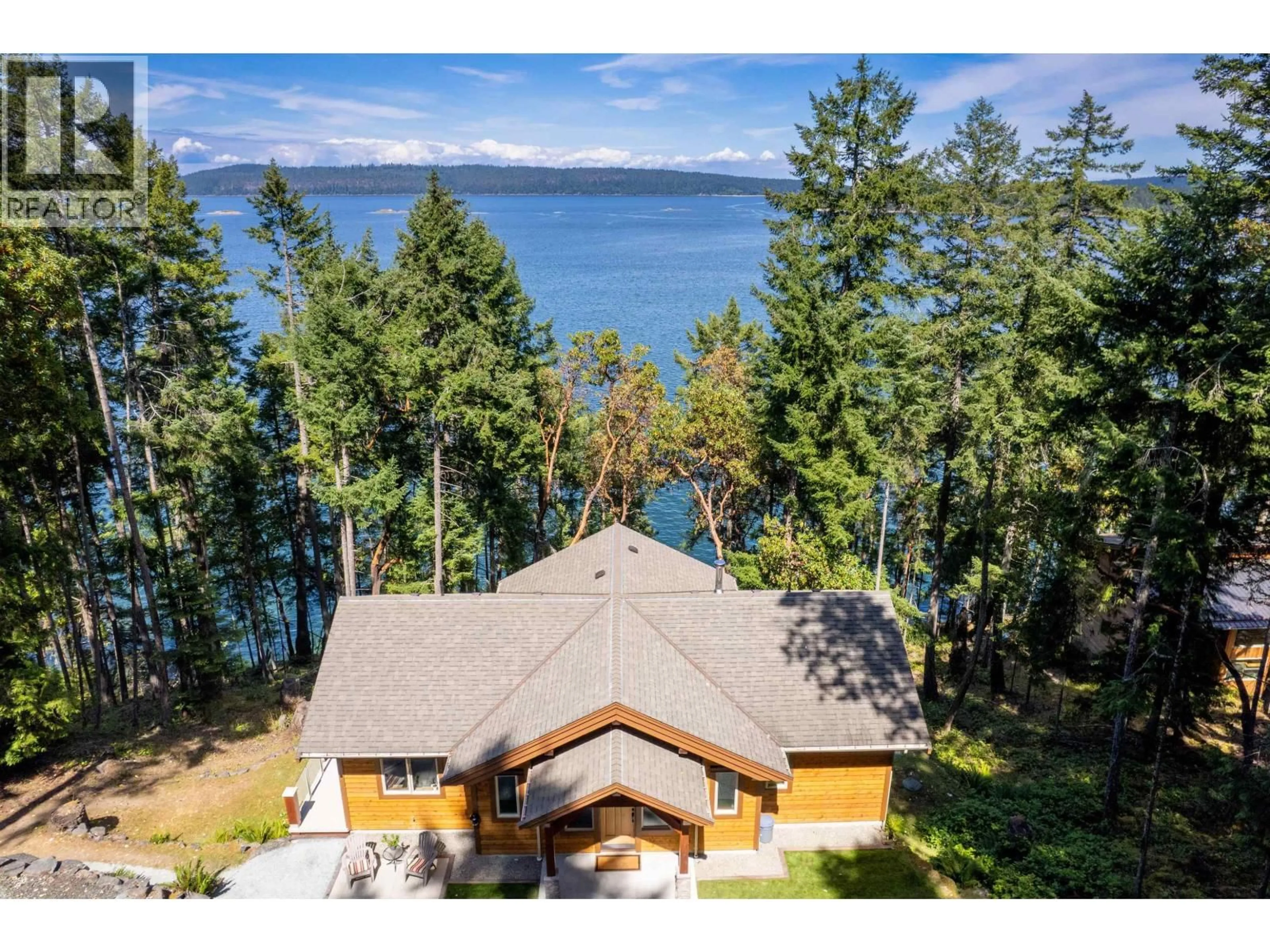 A pic from outside/outdoor area/front of a property/back of a property/a pic from drone, water/lake/river/ocean view for 144 SUNRISE POINT ROAD, Other Islands British Columbia V0R2Y0