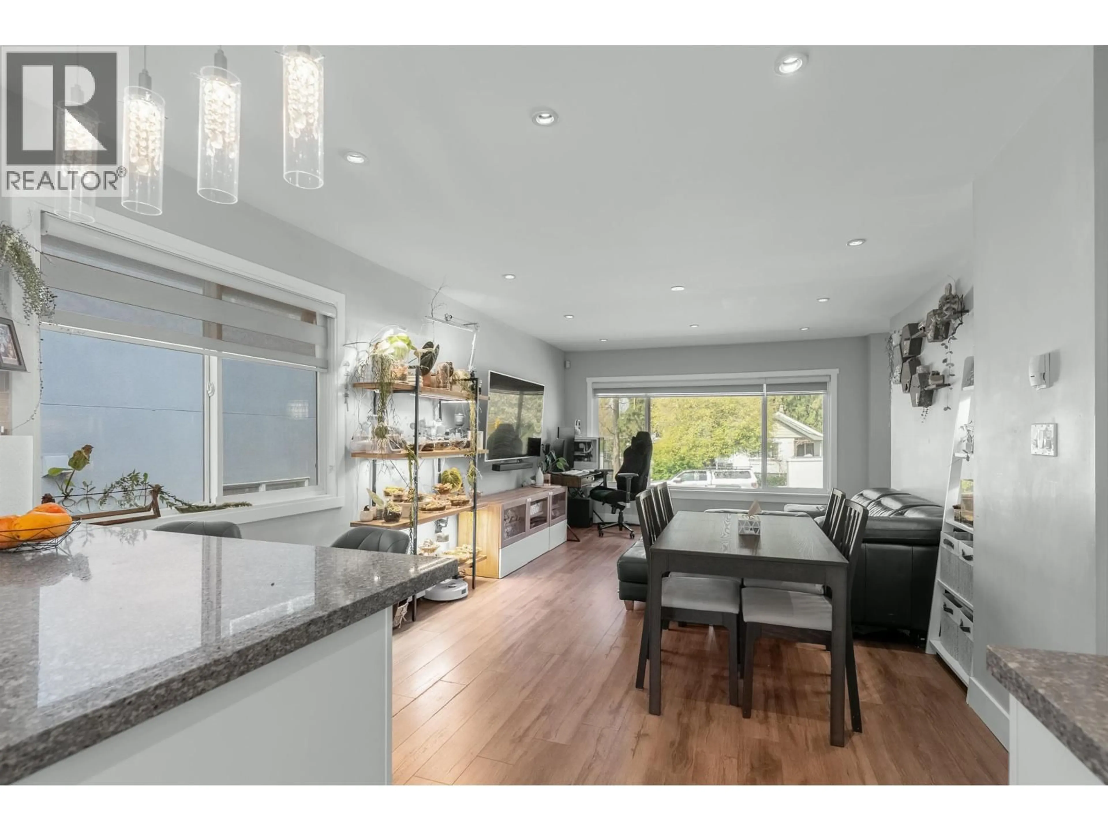Open concept kitchen, wood/laminate floor for 2576 27TH AVENUE, Vancouver British Columbia V5R1N1