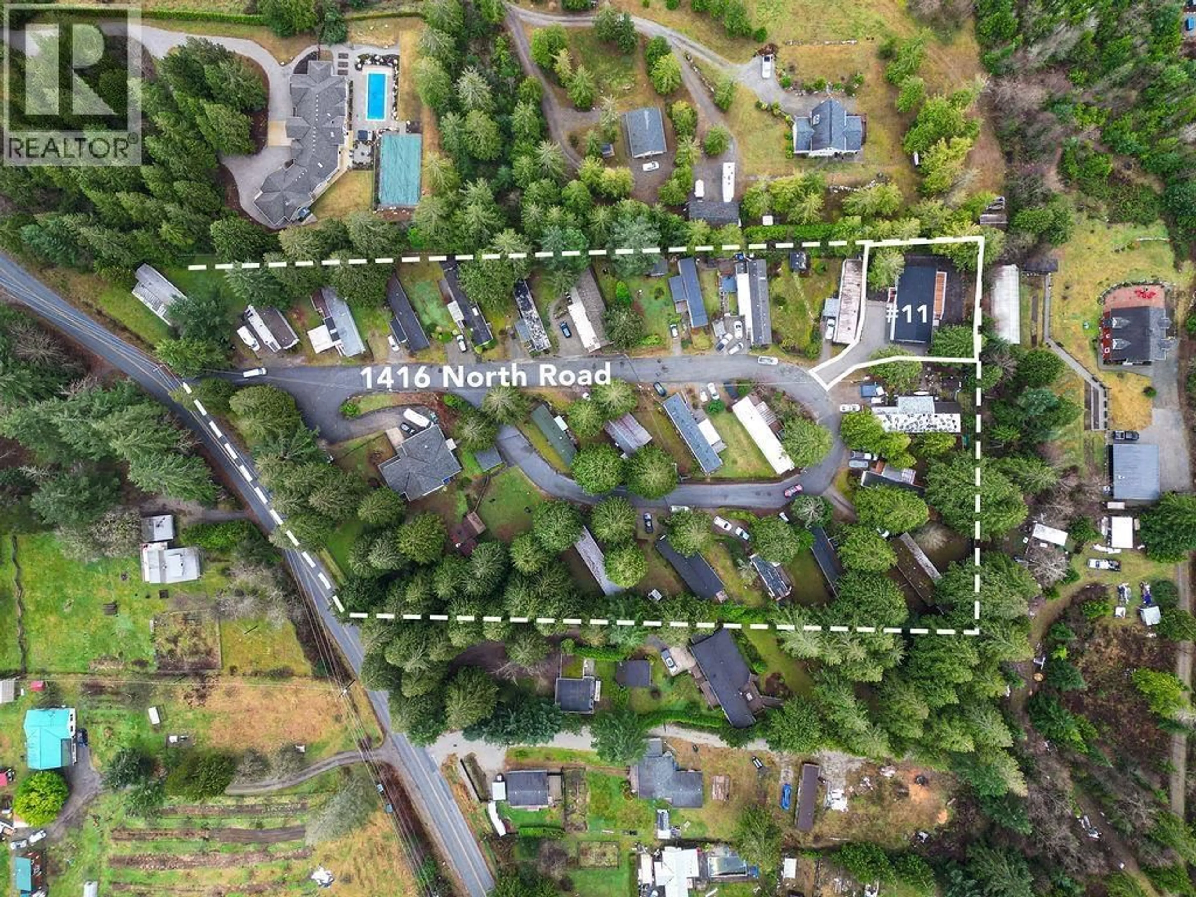 A pic from outside/outdoor area/front of a property/back of a property/a pic from drone, street for 11 - 1416 NORTH ROAD, Gibsons British Columbia V0N1V1