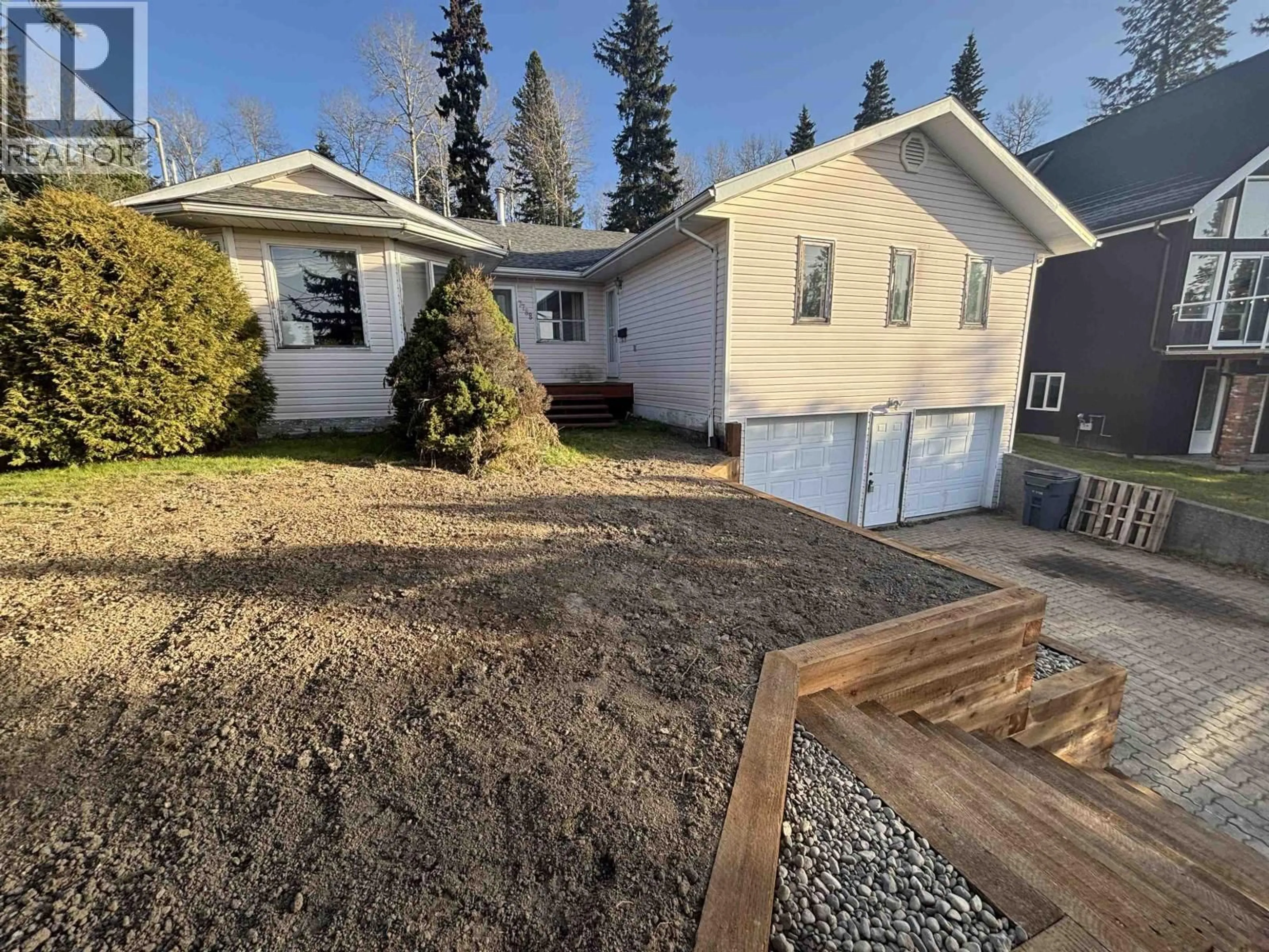 A pic from outside/outdoor area/front of a property/back of a property/a pic from drone, street for 7788 THOMPSON DRIVE, Prince George British Columbia V2N5N5