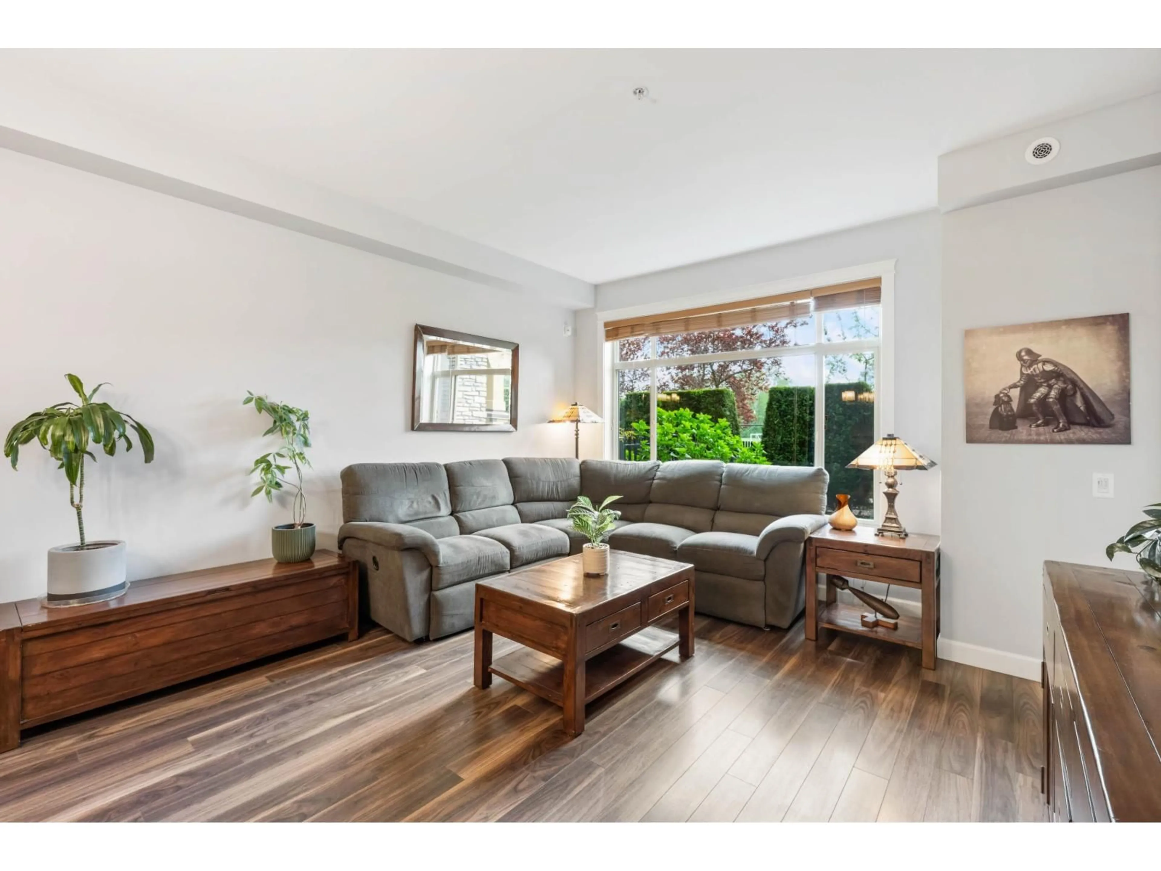 Living room with furniture, wood/laminate floor for 133 - 8157 207 STREET, Langley British Columbia V2Y0V3