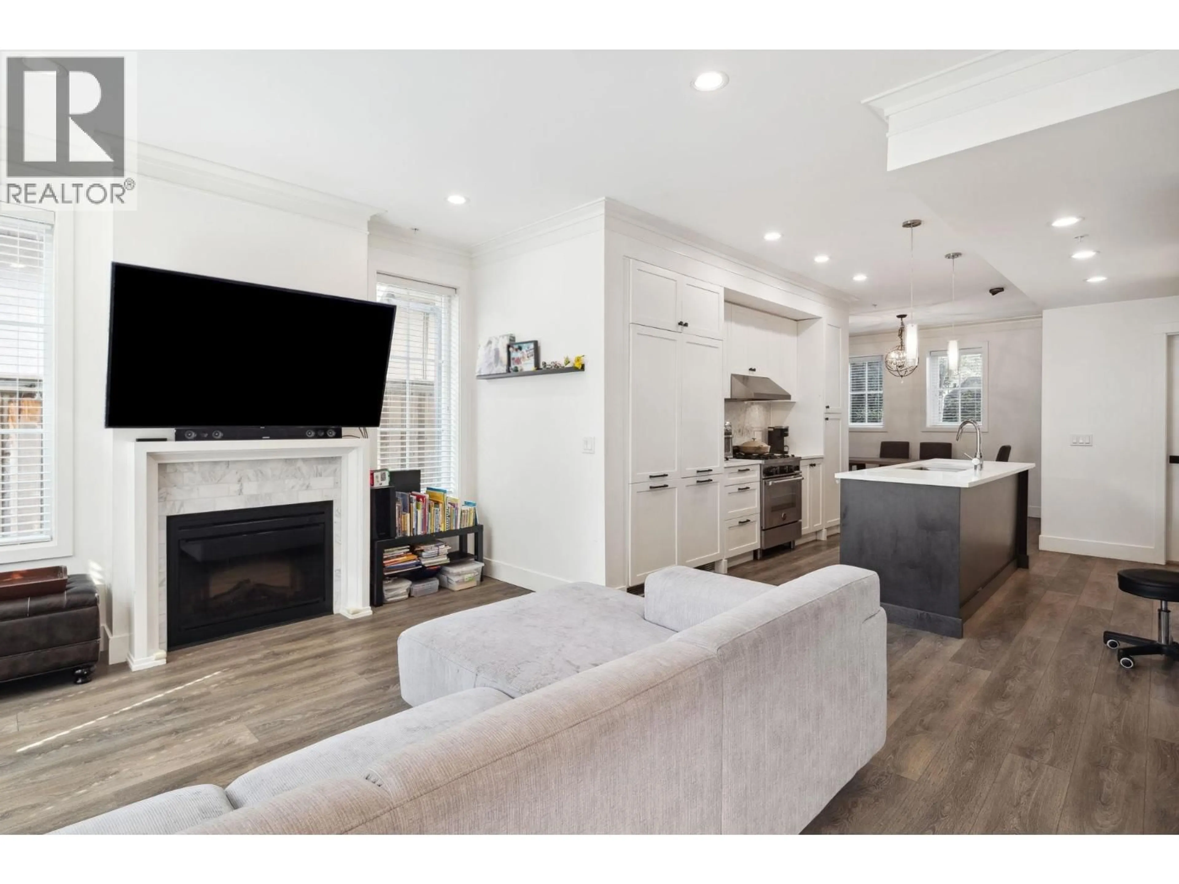 Open concept kitchen, wood/laminate floor for 352 62ND AVENUE, Vancouver British Columbia V5X2E3