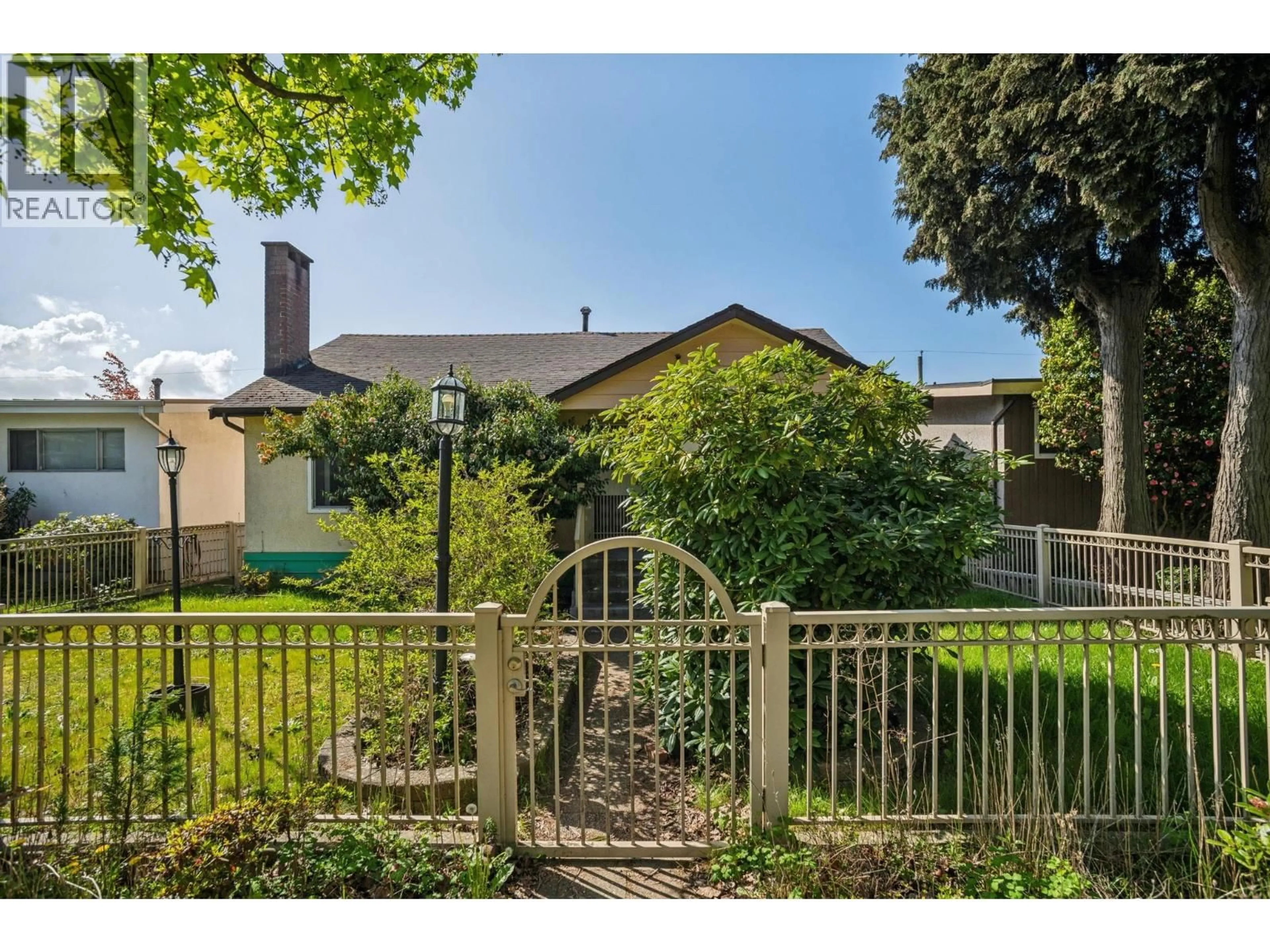 A pic from outside/outdoor area/front of a property/back of a property/a pic from drone, street for 1388 60TH AVENUE, Vancouver British Columbia V5X2A9