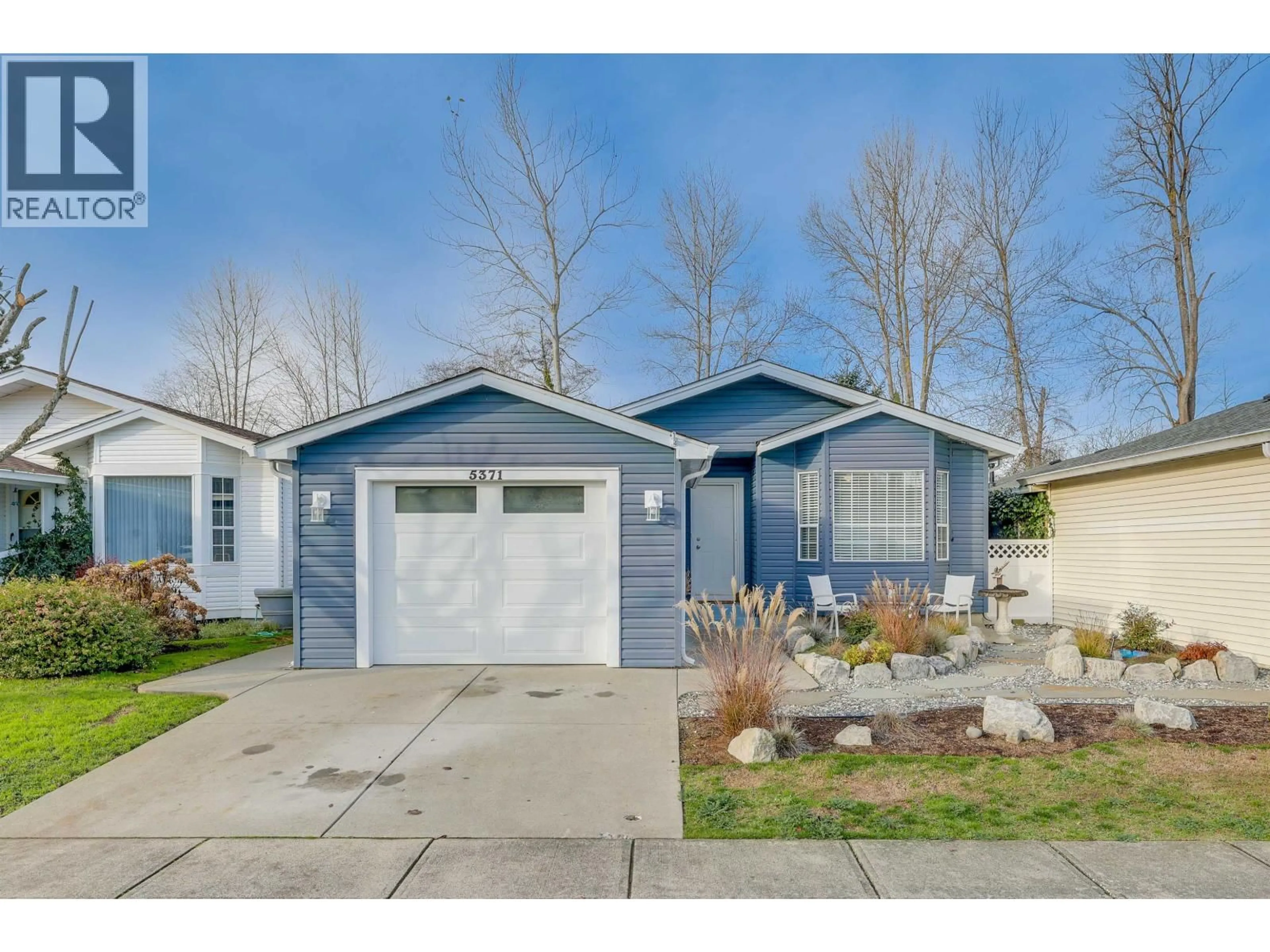 Home with vinyl exterior material, street for 5371 REGATTA WAY, Ladner British Columbia V4K4R9