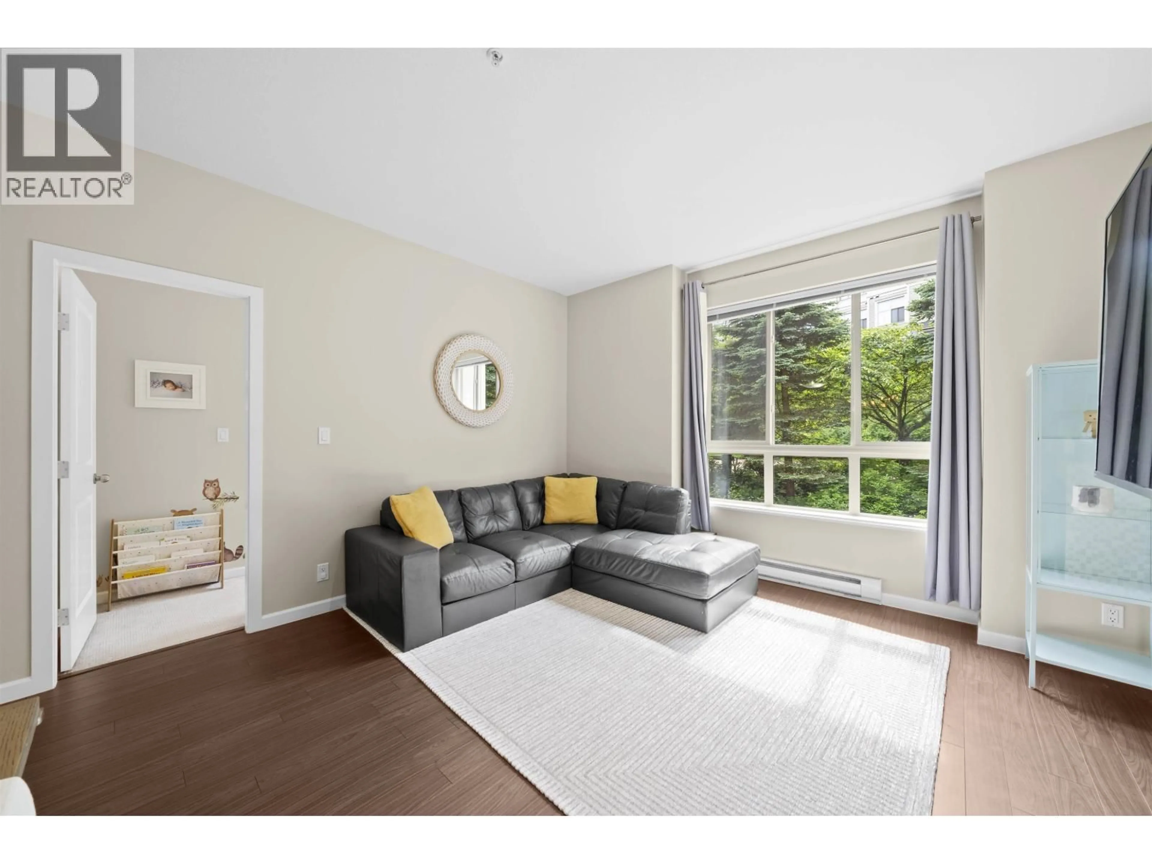Living room with furniture, unknown for 209 - 270 FRANCIS WAY, New Westminster British Columbia V3L0C3
