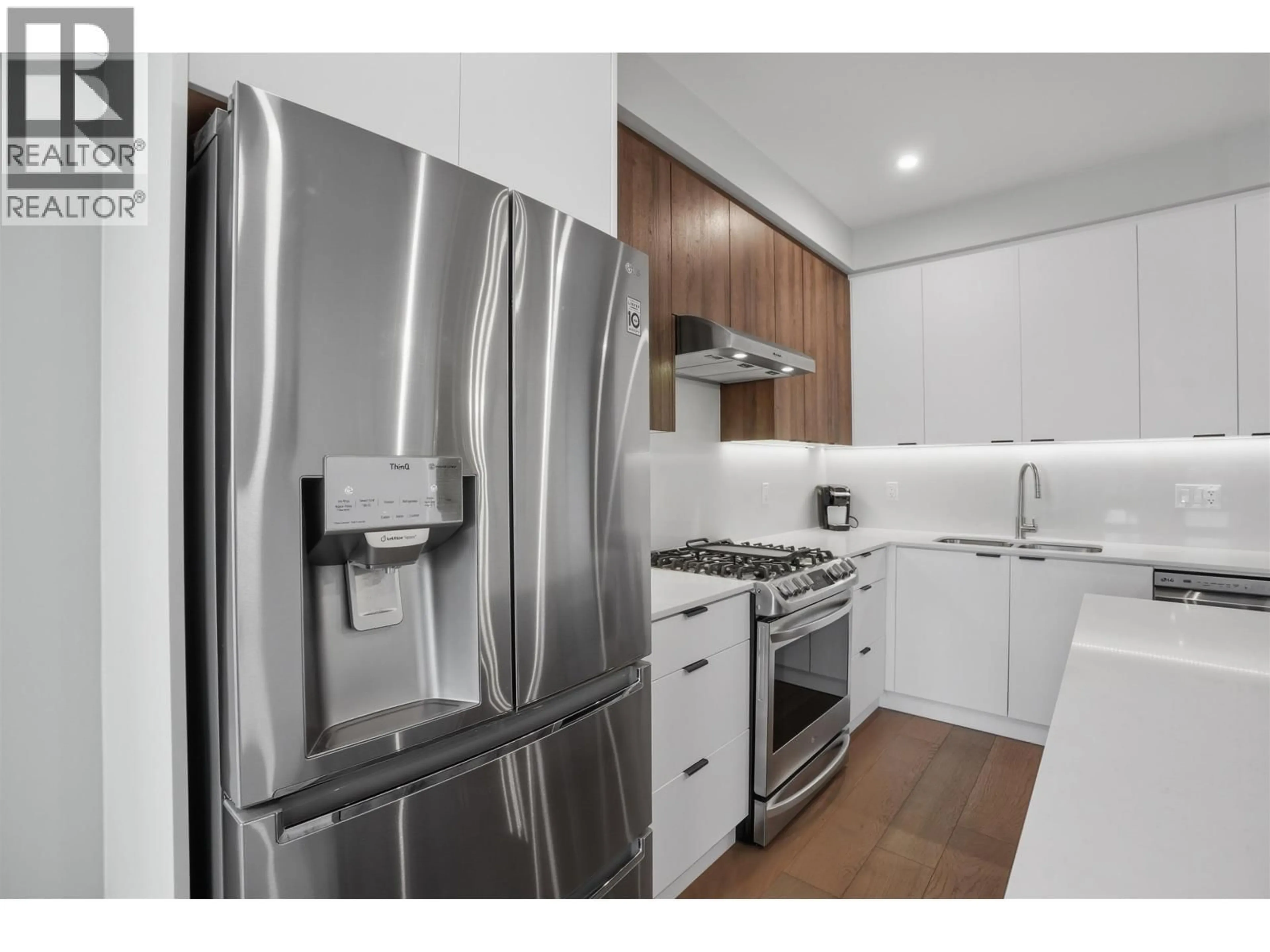 Standard kitchen, wood/laminate floor for 301 - 4686 51 STREET, Ladner British Columbia V4K0E5