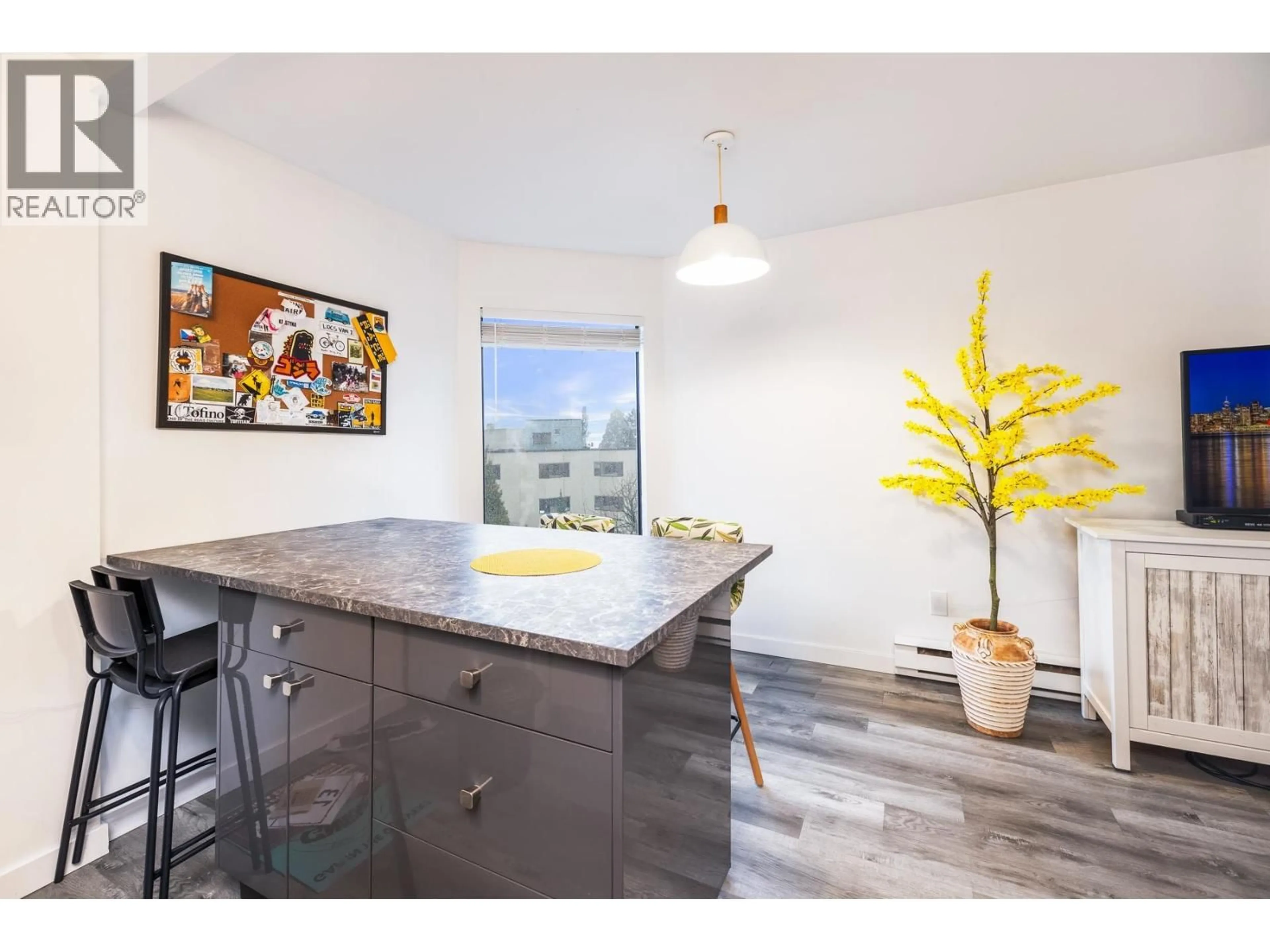 Open concept kitchen, wood/laminate floor for 408 - 340 GINGER DRIVE, New Westminster British Columbia V3L5L7