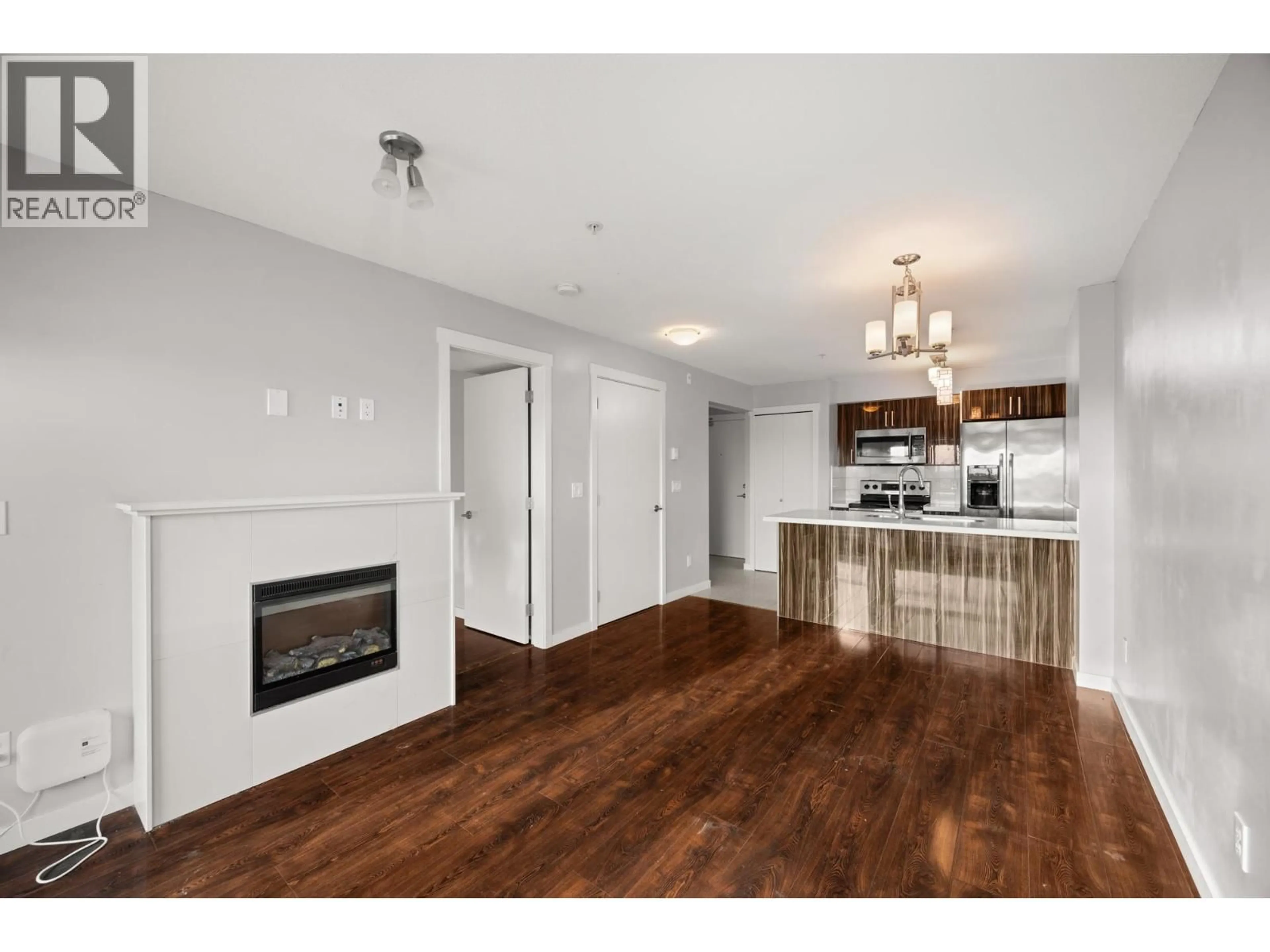 Open concept kitchen, wood/laminate floor for 503 - 22318 LOUGHEED HIGHWAY, Maple Ridge British Columbia V2X2T4
