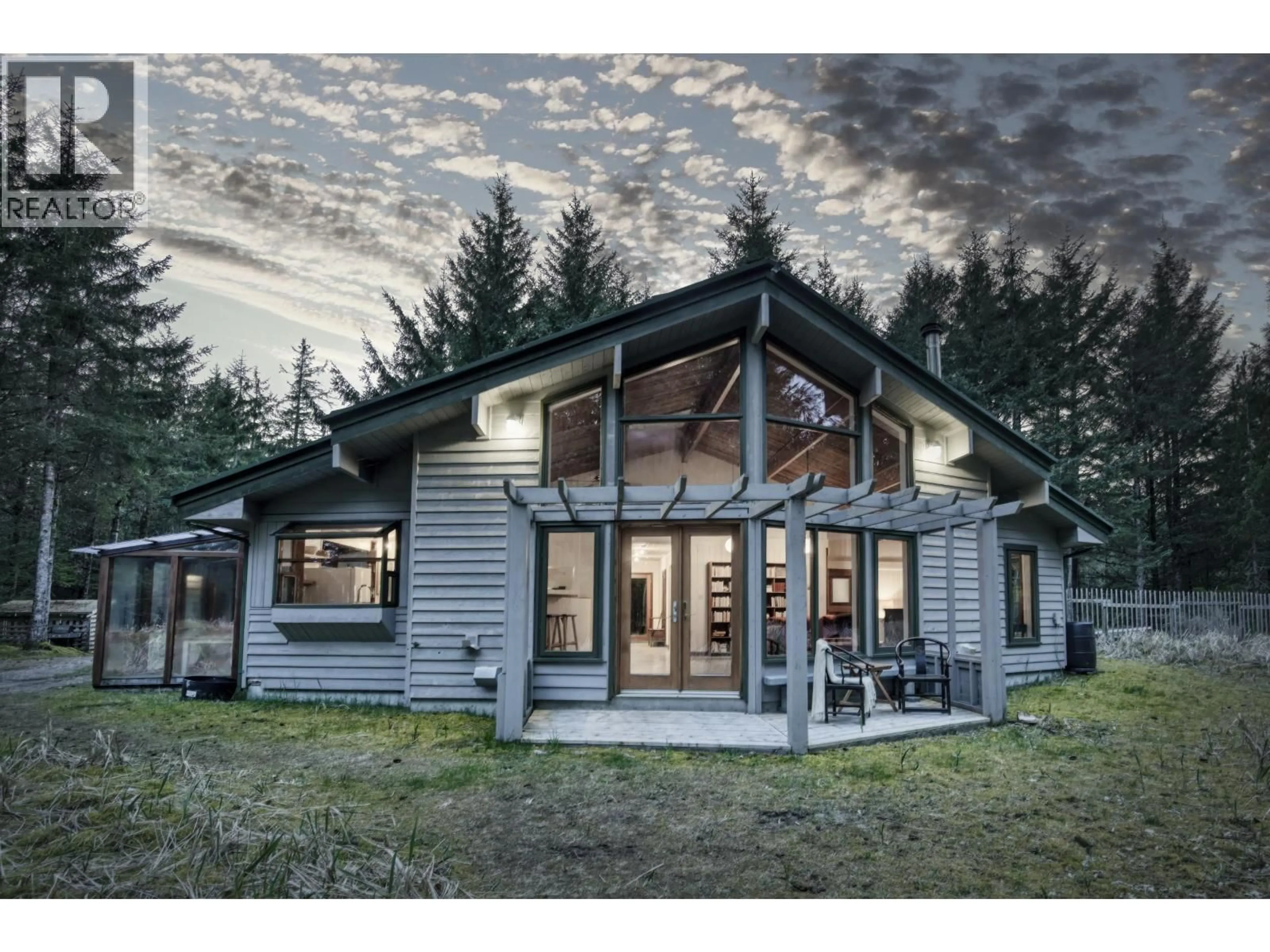Home with vinyl exterior material, mountain view for 1995 BEITUSH ROAD, Daajing Giids City British Columbia V0T1Y0