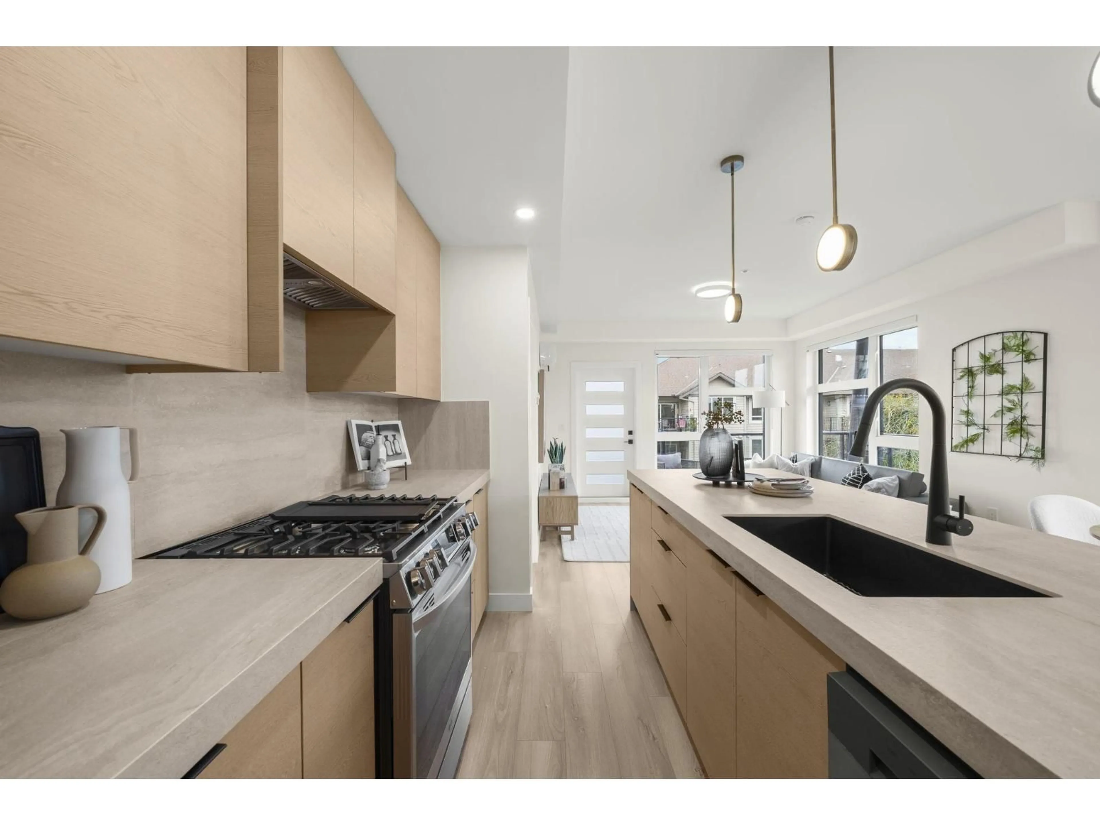Open concept kitchen, unknown for 304 - 15353 17 AVENUE, Surrey British Columbia V4A1T8