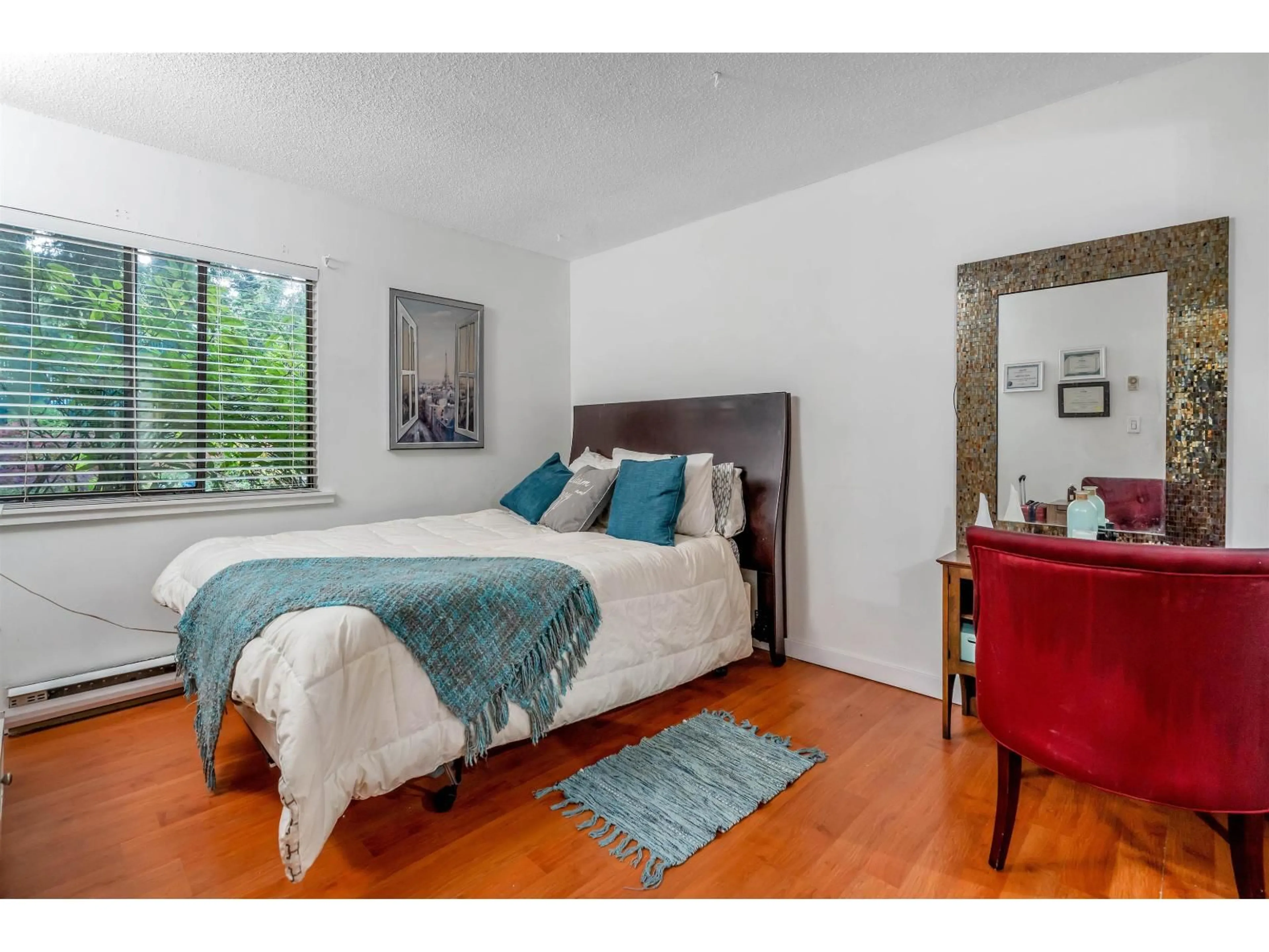 Bedroom with bed, wood/laminate floor for 813 - 10620 150 STREET, Surrey British Columbia V3R7S1