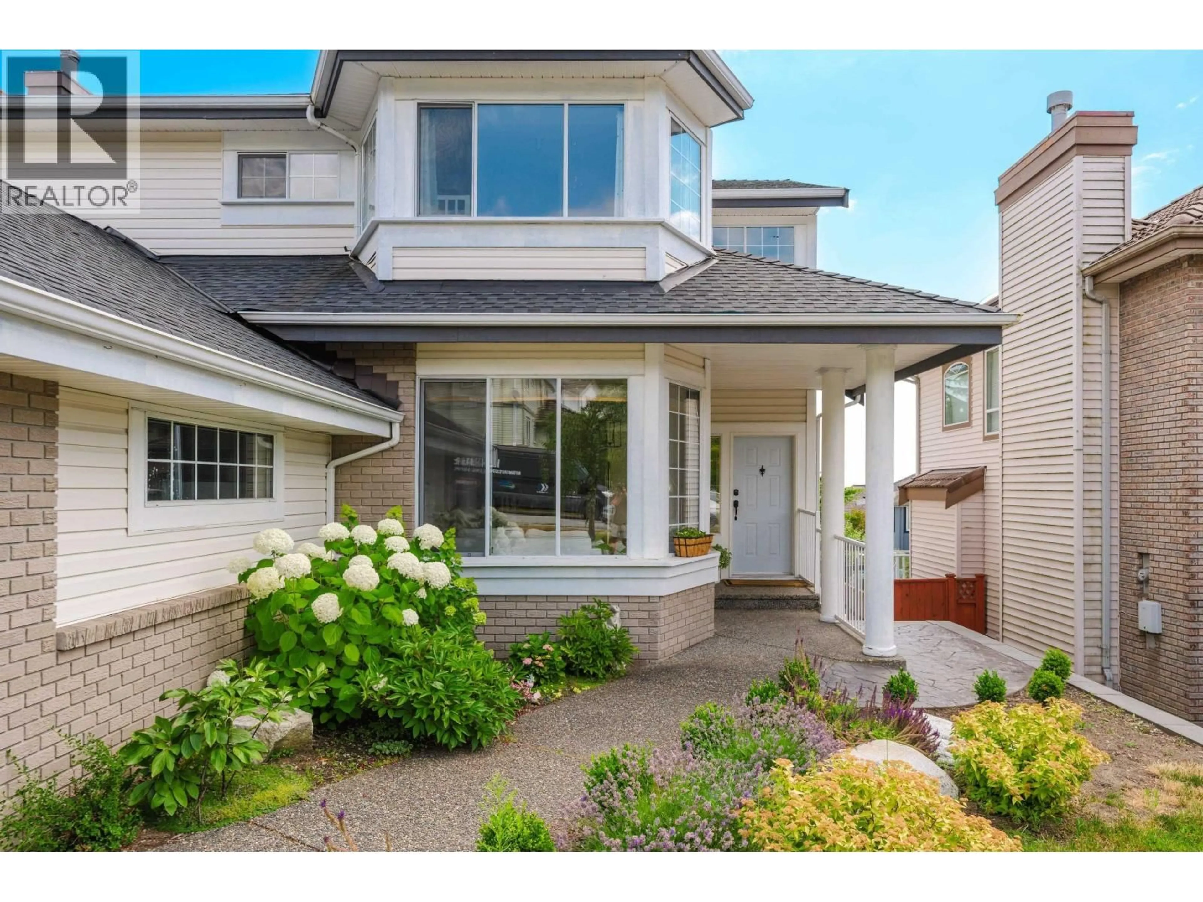 Home with vinyl exterior material, street for 2876 WOODSIA PLACE, Coquitlam British Columbia V3E2Y2