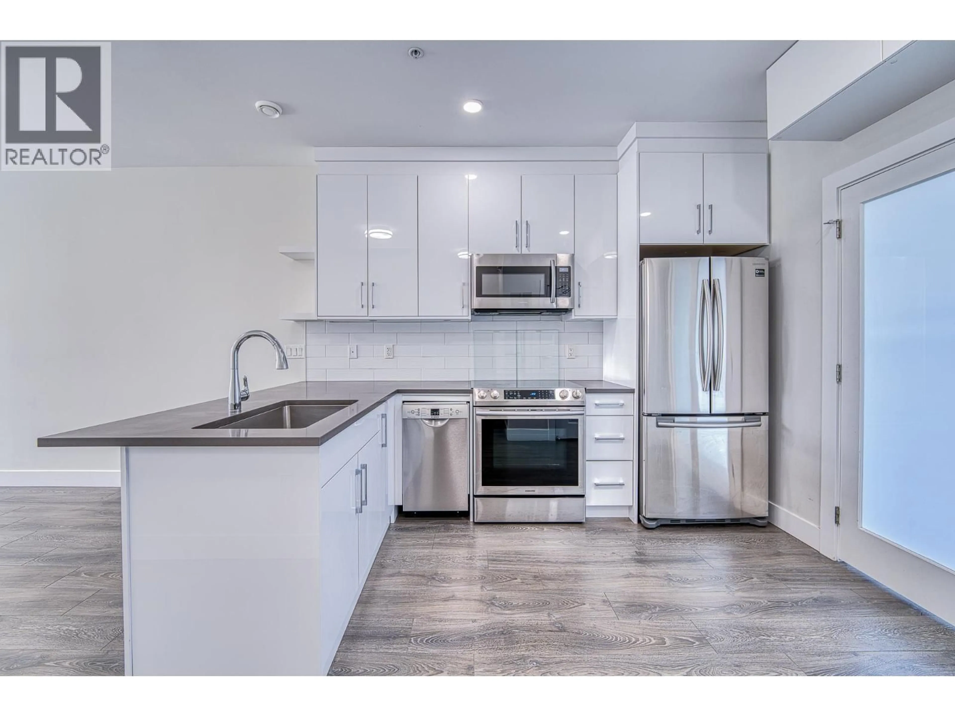 Open concept kitchen, unknown for 5063 EARLES STREET, Vancouver British Columbia V5R3R8