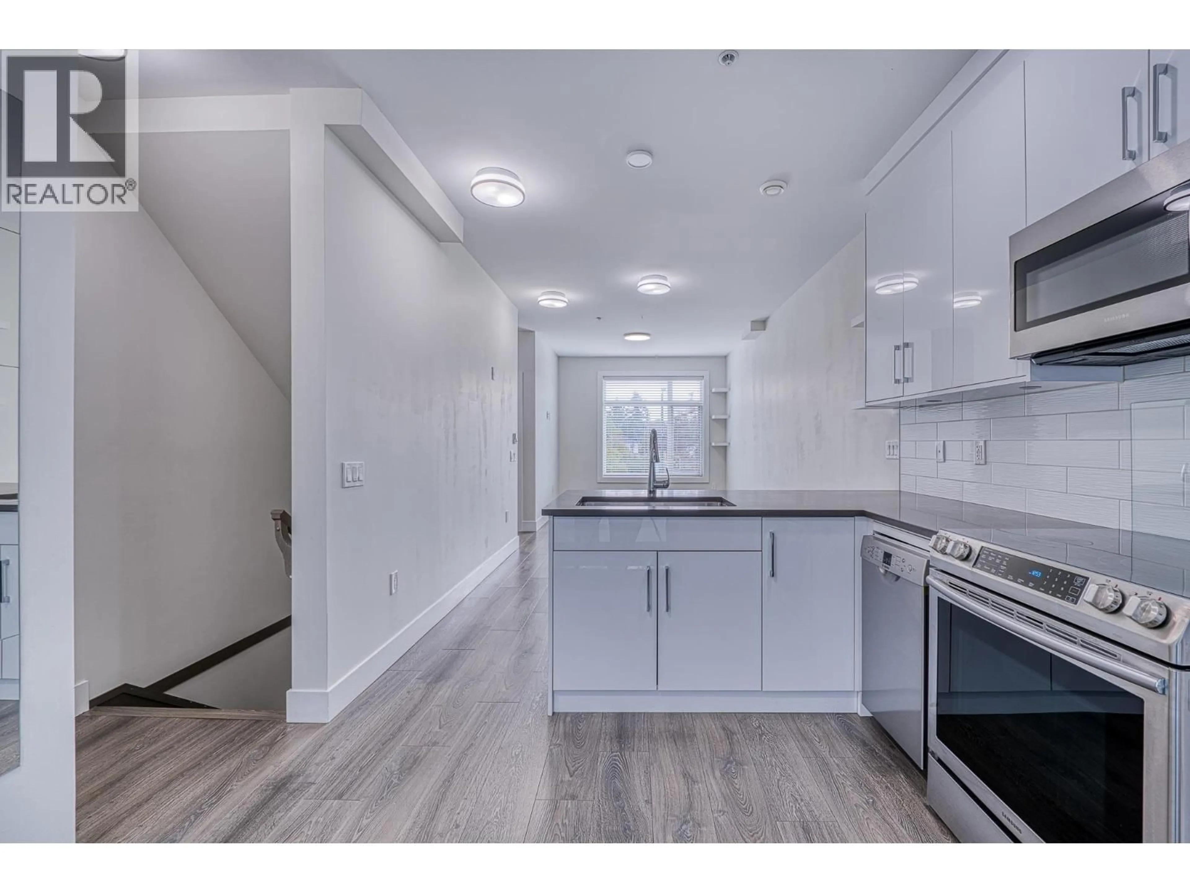Open concept kitchen, unknown for 5063 EARLES STREET, Vancouver British Columbia V5R3R8