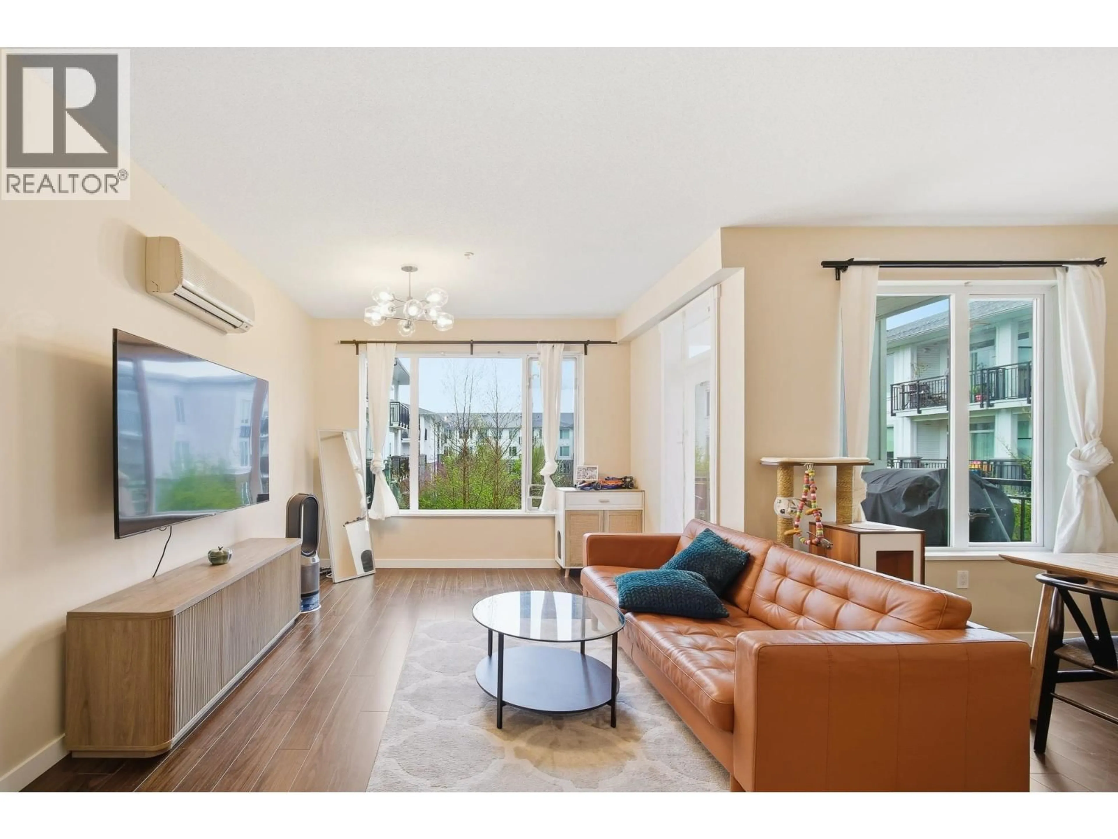 Living room with furniture, unknown for 339 - 9388 MCKIM WAY, Richmond British Columbia V6X0J7