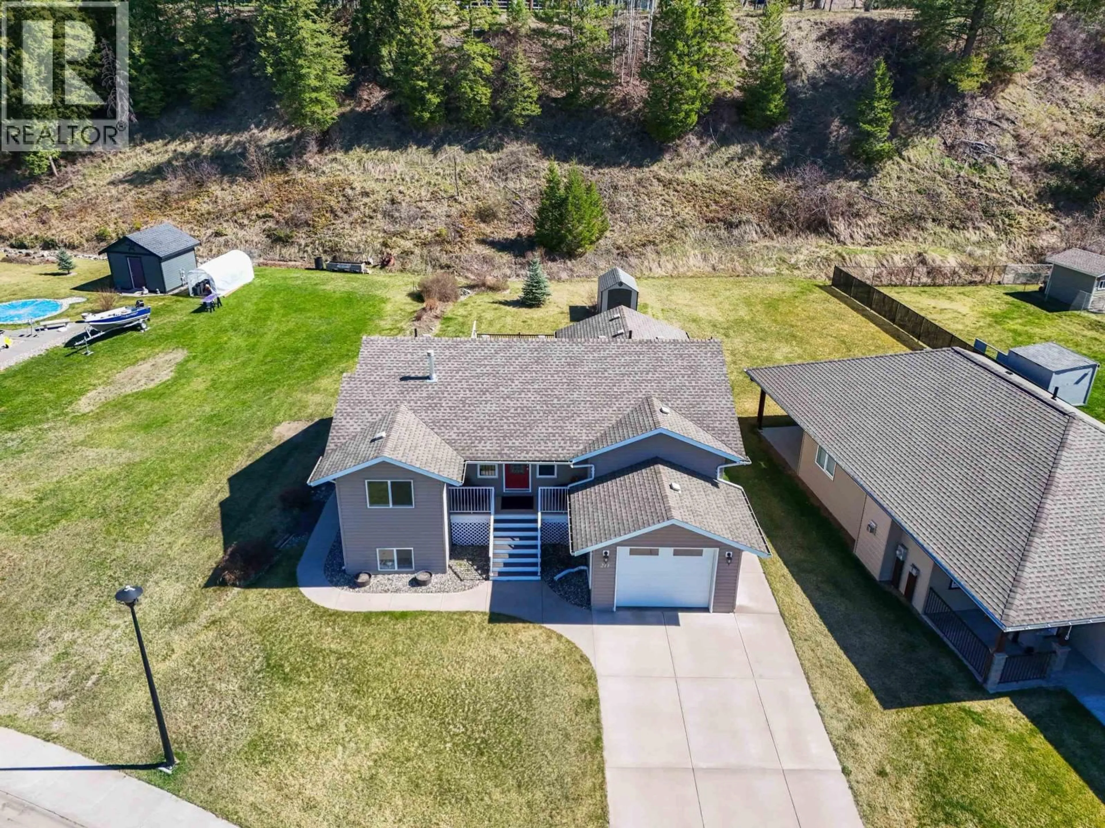 A pic from outside/outdoor area/front of a property/back of a property/a pic from drone, unknown for 211 NICKEL RIDGE AVENUE, Quesnel British Columbia V2J6P6